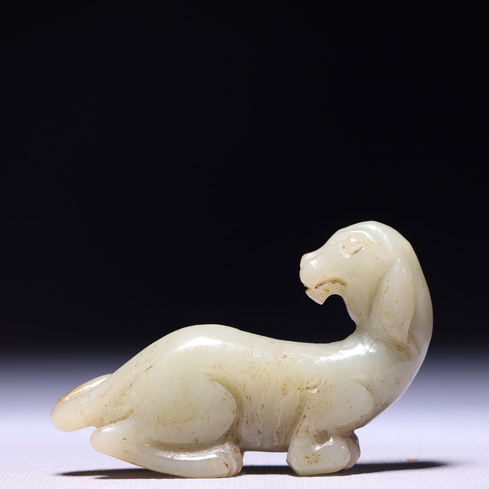 An Exquisite White Jade Beast Ornament: An Exquisite White Jade Beast Ornament,Qing Dynasty,China,Size:2.8inx0.8inx1.8in,Weight:62g 白玉兽摆件,中国清代