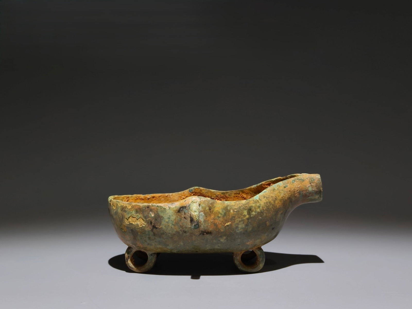 An Archaic Bronze Cup: An Archaic Bronze Cup,the Warring States period in China,Size:3inx6.7inx4.1in 青铜杯子,中国战国时期