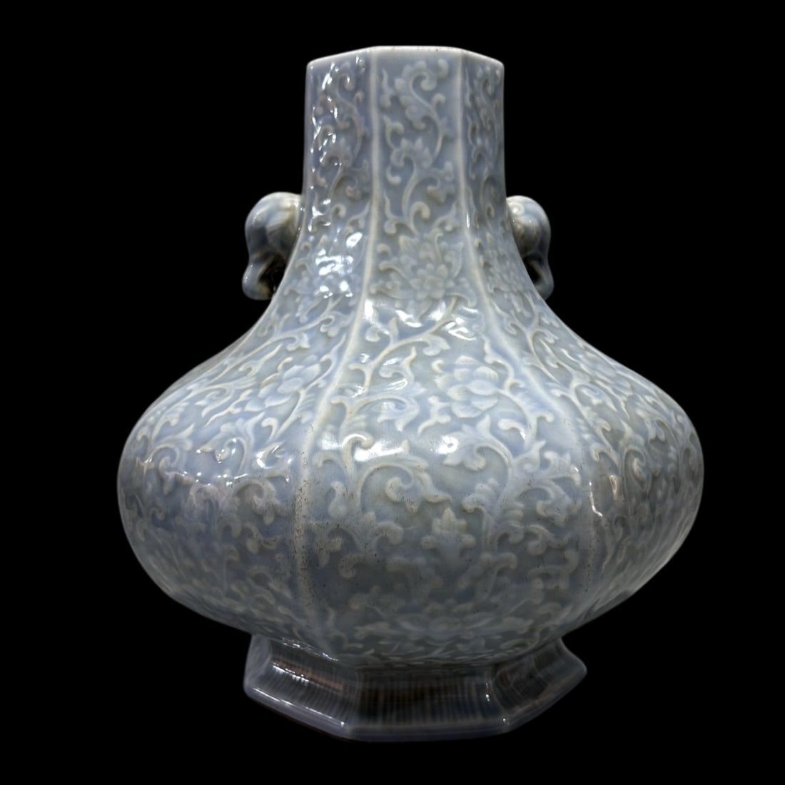 An Exquisite Celadon Glazed Lotus Pattern Elephant-Ears Vase: An Exquisite Celadon Glazed Lotus Pattern Elephant-Ears Vase,Qing Dynasty,China,Qianlong Six-character Mark,Size:7.5inx9.6in