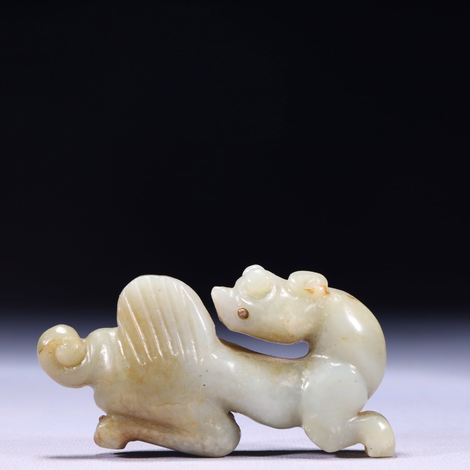 An Exquisite White Jade Beast Ornament: An Exquisite White Jade Beast Ornament,Qing Dynasty,China,Size:3.5inx0.8inx1.8in,Weight:134g 白玉兽摆件,中国清代