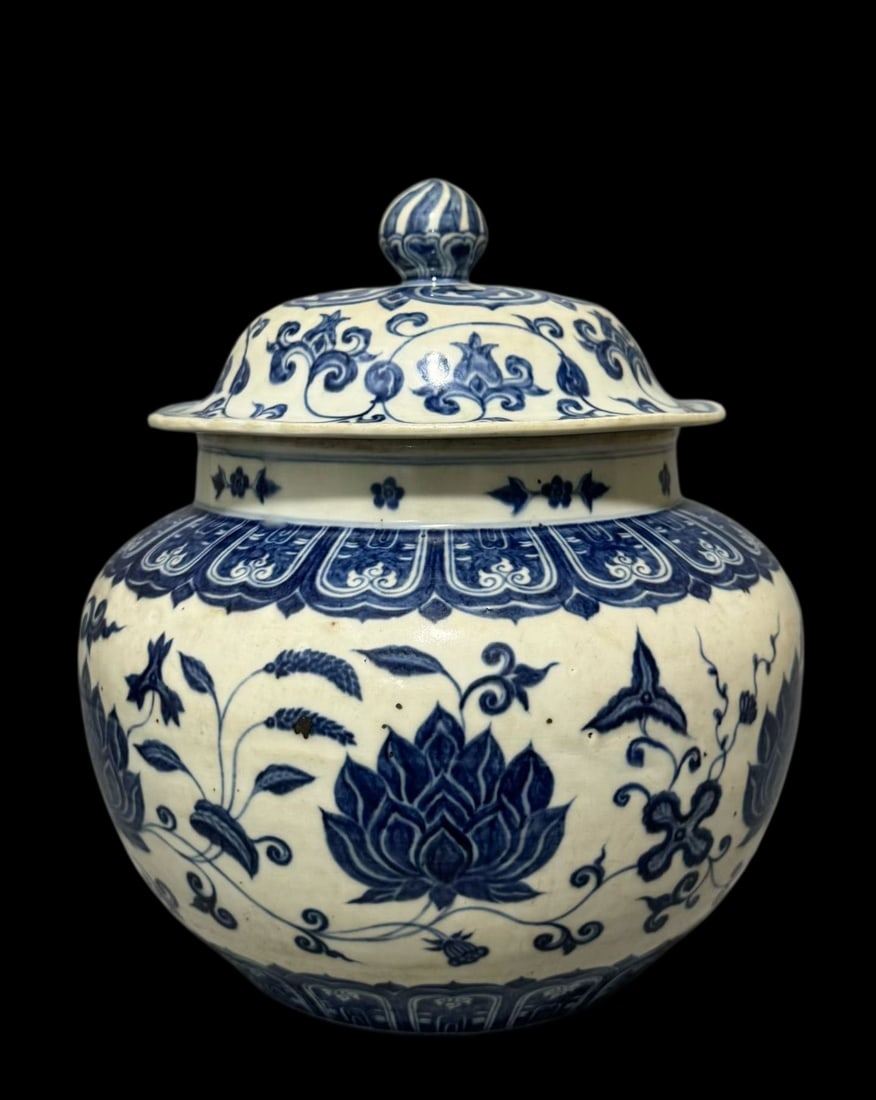 An Exquisite Blue and White Lotus Pattern Jar with Cover: An Exquisite Blue and White Lotus Pattern Jar with Cover,Ming Dynasty,China,Xuande Six-character Mark,Size:11.4inx8.5in
