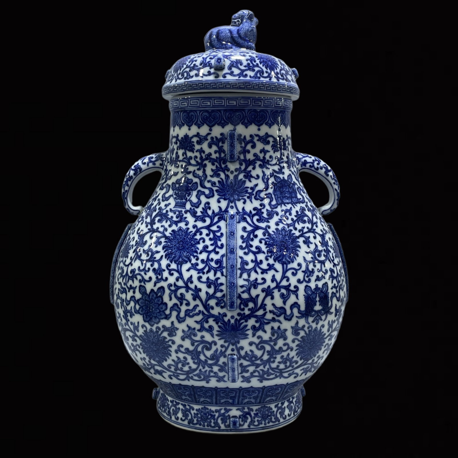 A Huge Blue and White Lotus Pattern Double-Ears Jar with Cover: A Huge Blue and White Lotus Pattern Double-Ears Jar with Cover,Qing Dynasty,China,Qianlong Six-character Mark,Size:21.5inx12.6in 青花缠枝莲纹双耳盖