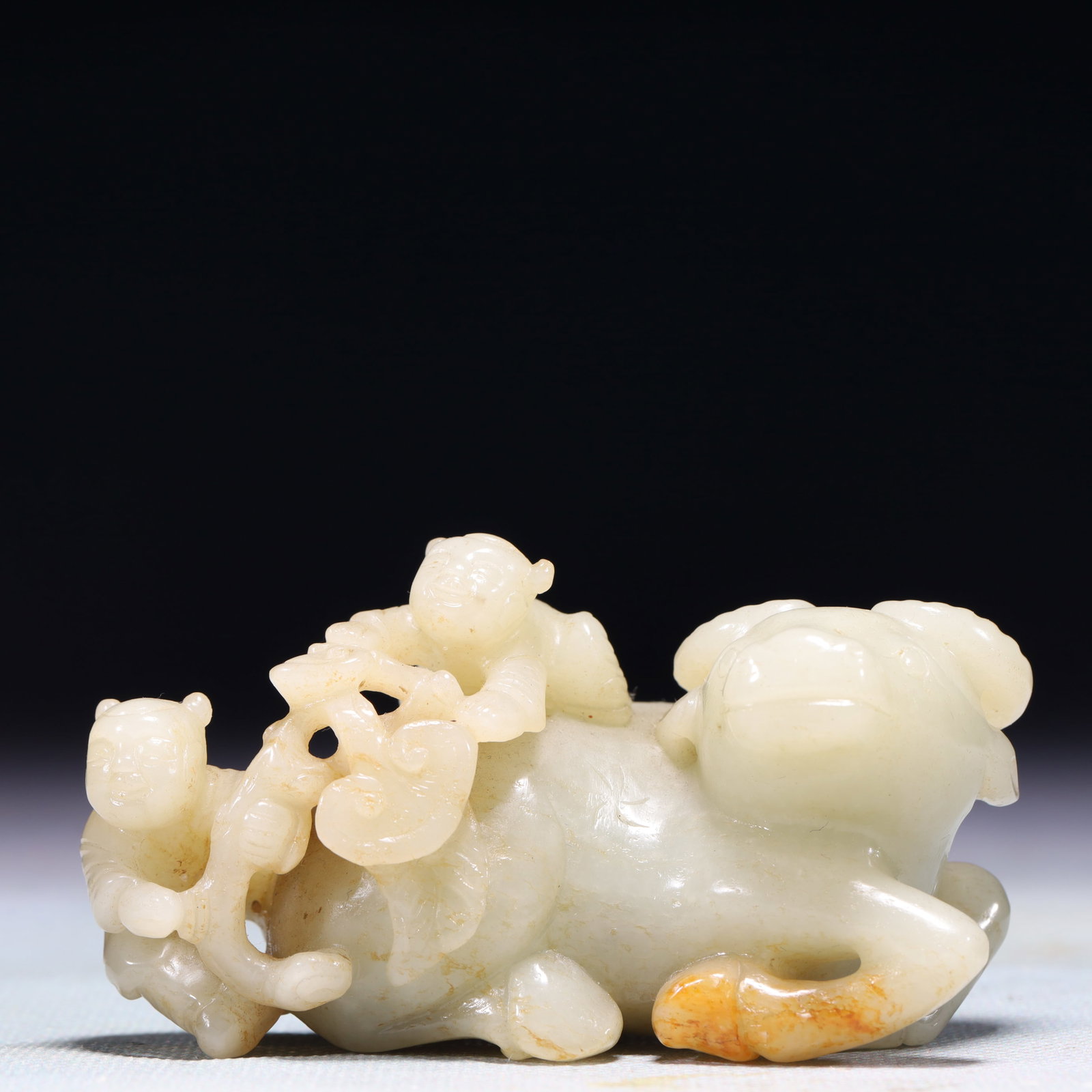 An Exquisite White Jade Figure Riding Buffalo Ornament: An Exquisite White Jade Figure Riding Buffalo Ornament,Qing Dynasty,China,Size:3.5inx1.6inx2in,Weight:208.4g