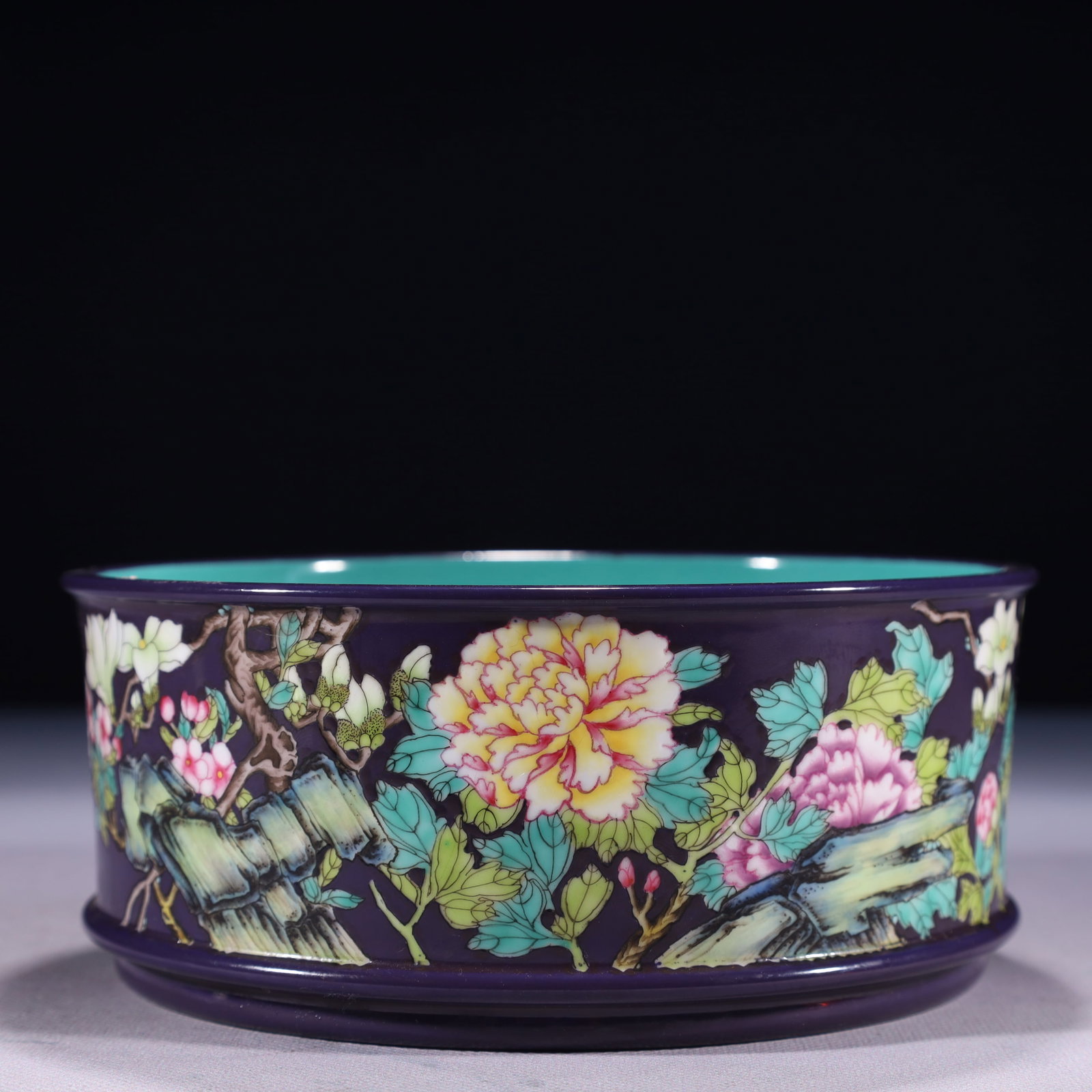 An Exquisite Blue Ground Famille-Rose Flower Pattern Basin: An Exquisite Blue Ground Famille-Rose Flower Pattern Basin,Qing Dynasty,China,Yongzheng Four-character Mark,Size:7.3inx3in,Weight:950g