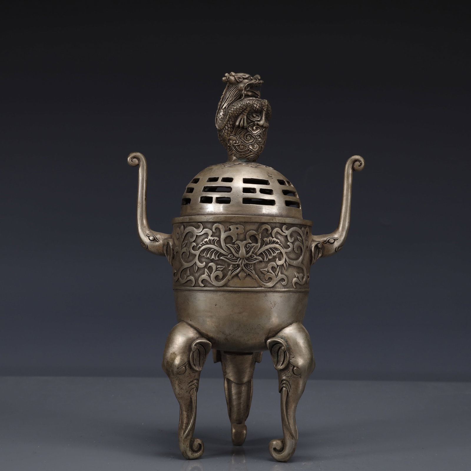 An Exquisite Silver-Plated Bronze Elephant Pattern Double-Ears and Tripod Censer: An Exquisite Silver-Plated Bronze Elephant Pattern Double-Ears and Tripod Censer,Qing Dynasty, China,Qianlong Four-character Mark,Size:6.3inx3.9inx10.2in,Weight:1050g