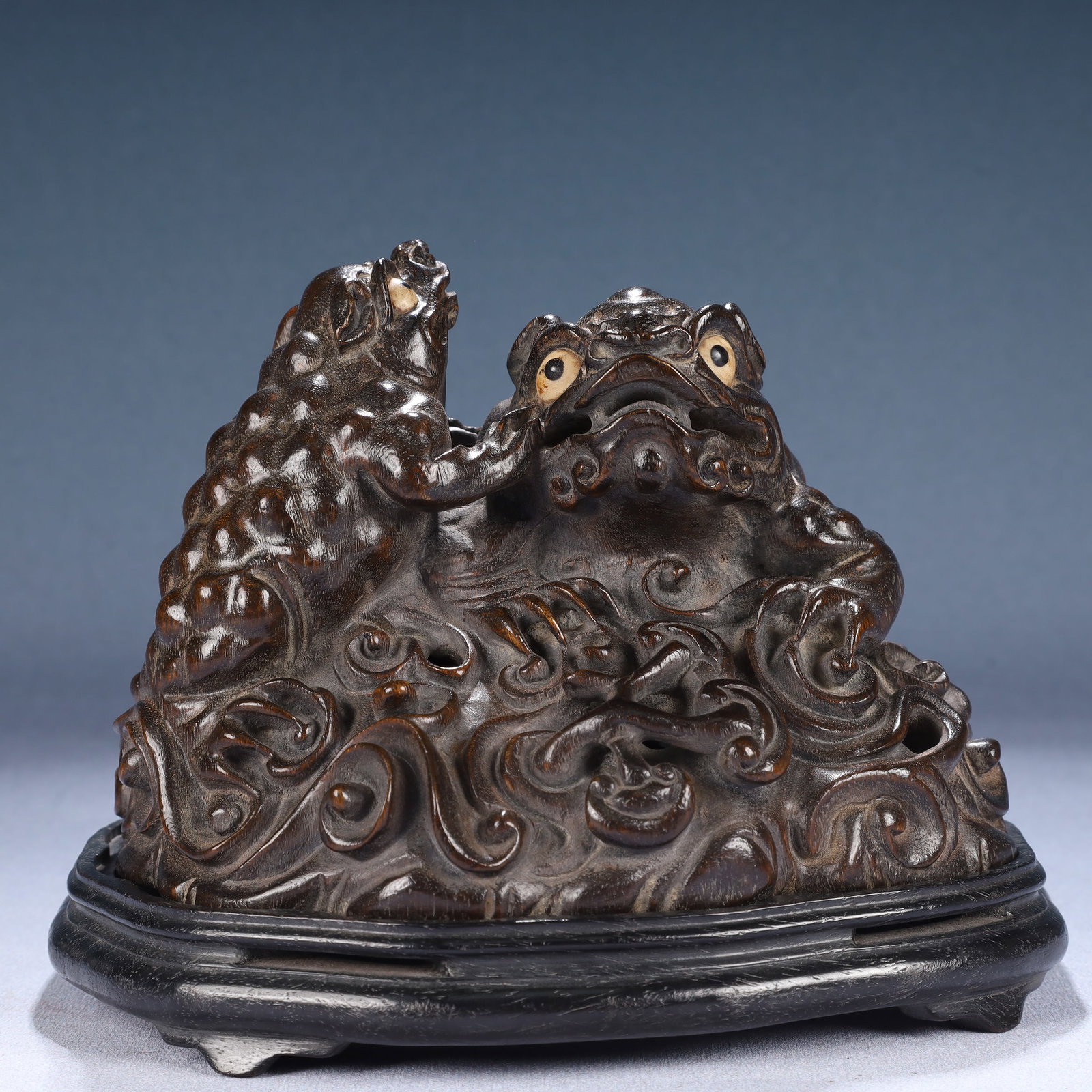 An Exquisite Zitanwood Auspicious Beast Ornament,With Base: An Exquisite Zitanwood Auspicious Beast Ornament,With Base,Qing Dynasty, China,Size:7.5inx5.5inx5.9in,Weight:700g 紫檀木瑞兽摆件,带底座,