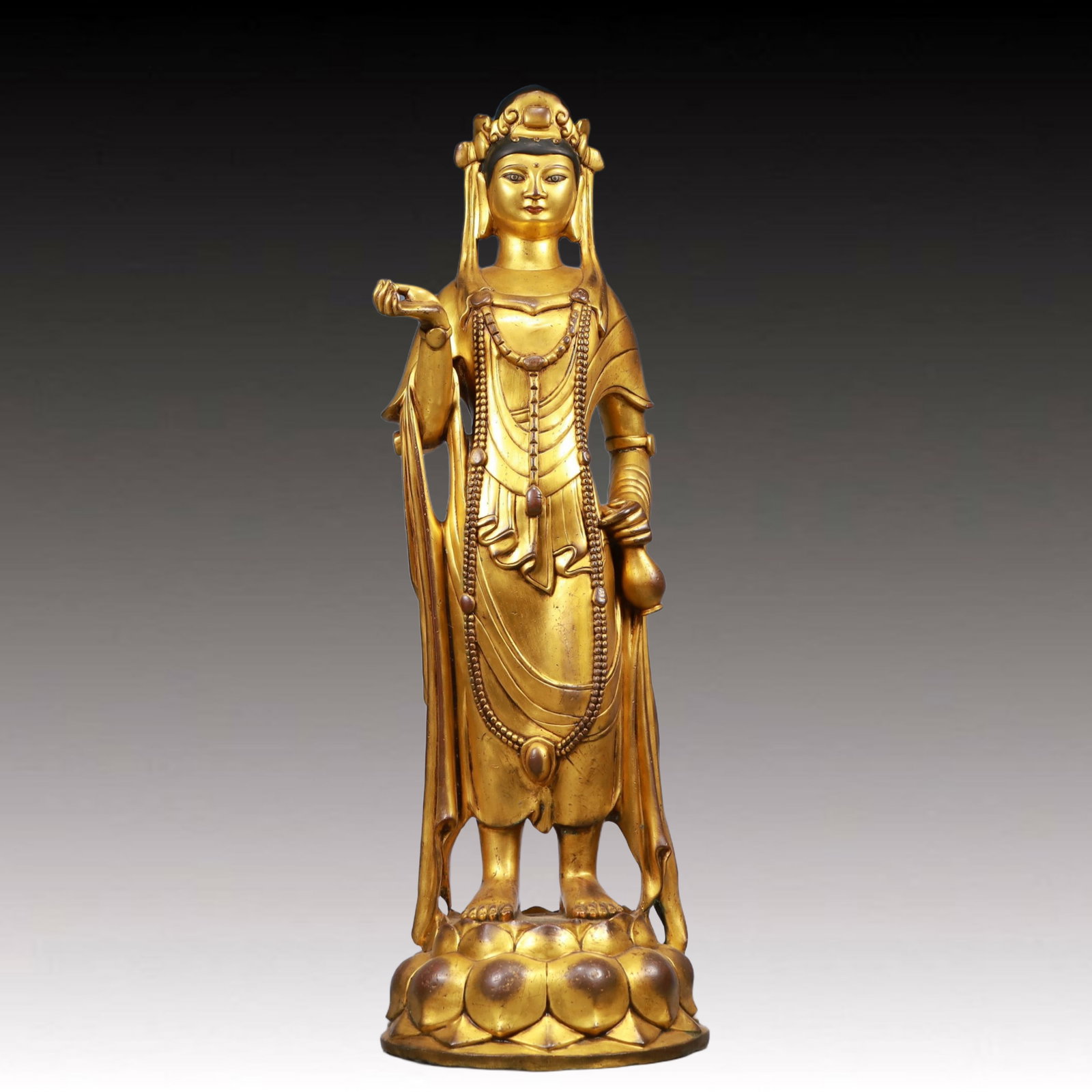 A Solemn Gilt Bronze Statue of Avalokitesvara: A Solemn Gilt Bronze Statue of Avalokitesvara, Ming Dynasty, China, Size:8.3inx28.1in, Weight:12950g