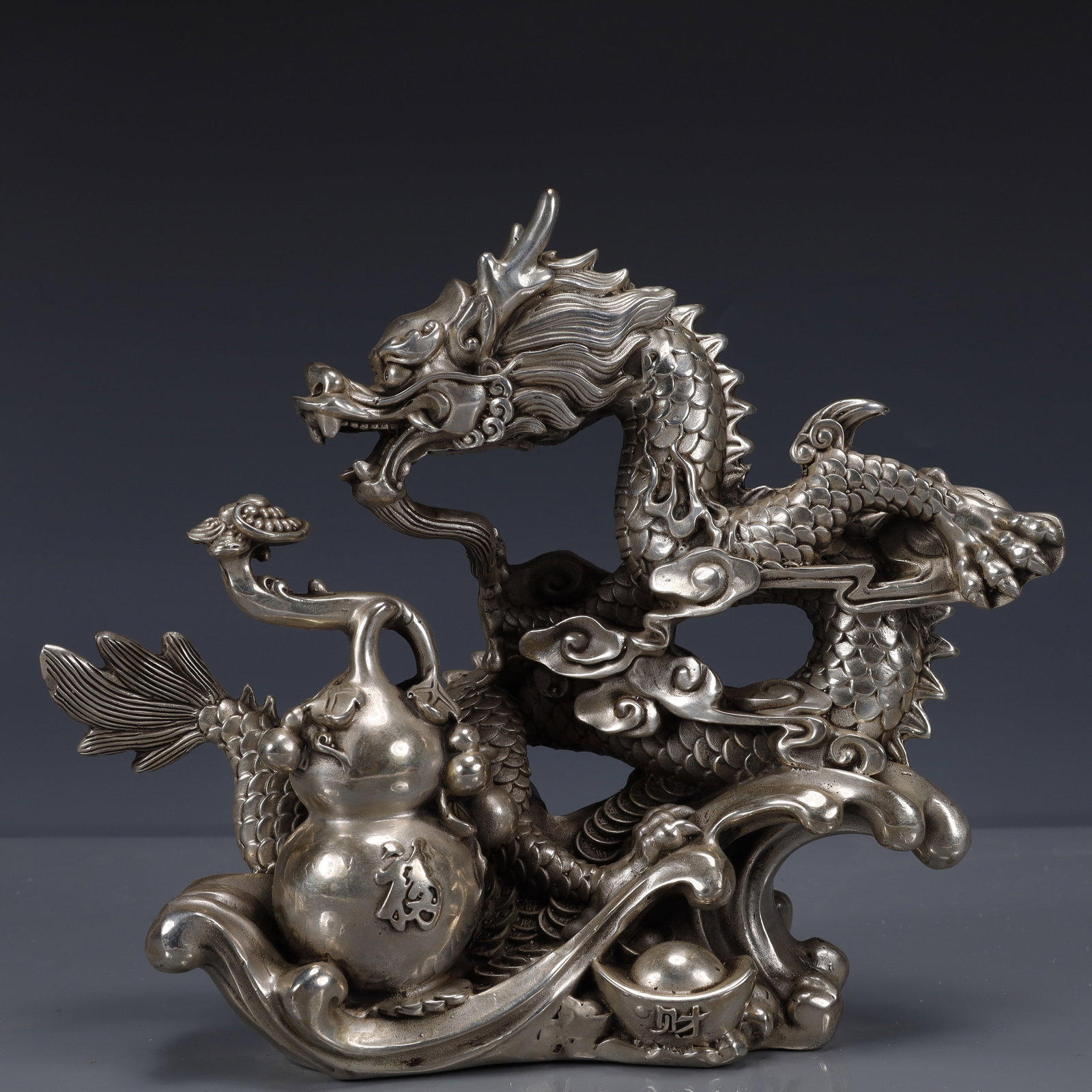 An Exquisite Silver-Plated Bronze Dragon Ornament: An Exquisite Silver-Plated Bronze Dragon Ornament,Qing Dynasty, China,Qianlong Four-character Mark,Size:9.8inx3.9inx7.9in,Weight:2400g