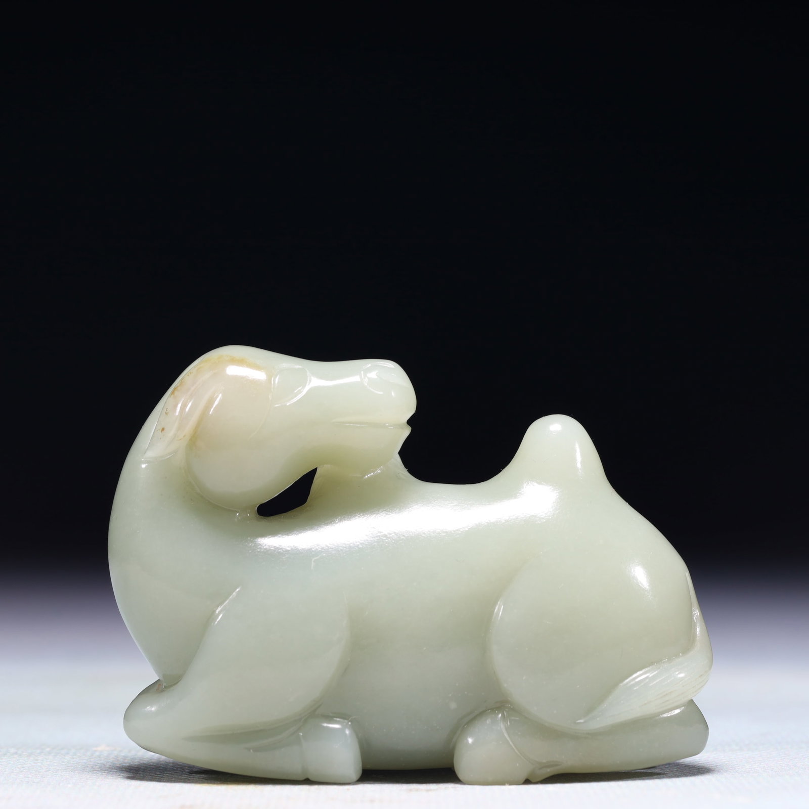 An Exquisite White Jade Camel Ornament: An Exquisite White Jade Camel Ornament,Qing Dynasty,China,Size:3inx0.8inx2in,Weight:155.2g 白玉骆驼摆件,中国清代