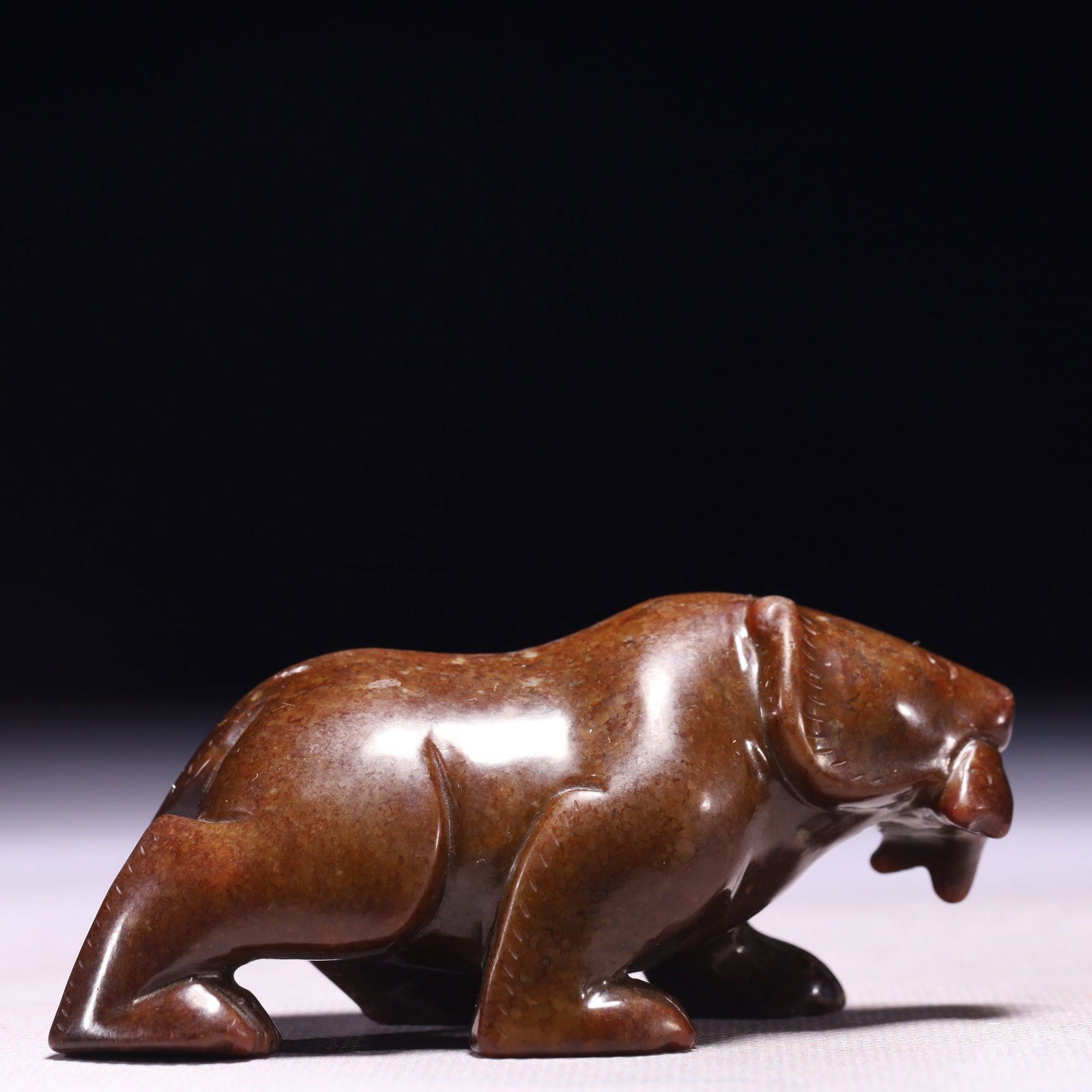 An Exquisite Archaic Jade Bear Ornament (1 of 8)