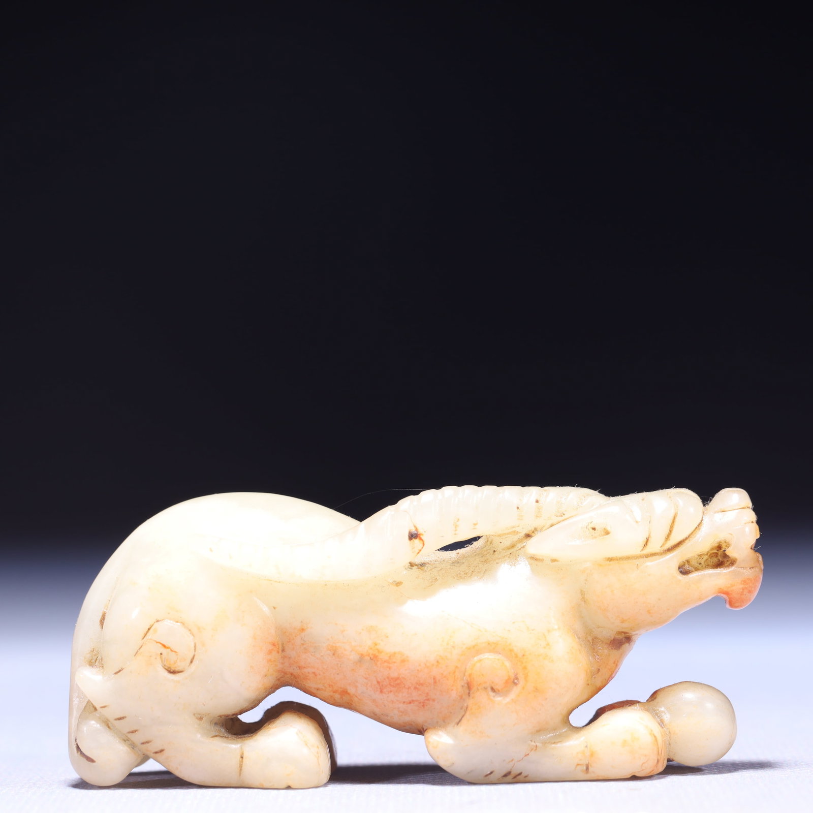 An Exquisite White Jade Beast Ornament: An Exquisite White Jade Beast Ornament,Qing Dynasty,China,Size:3.5inx0.8inx1.4in,Weight:119g 白玉兽摆件,中国清代