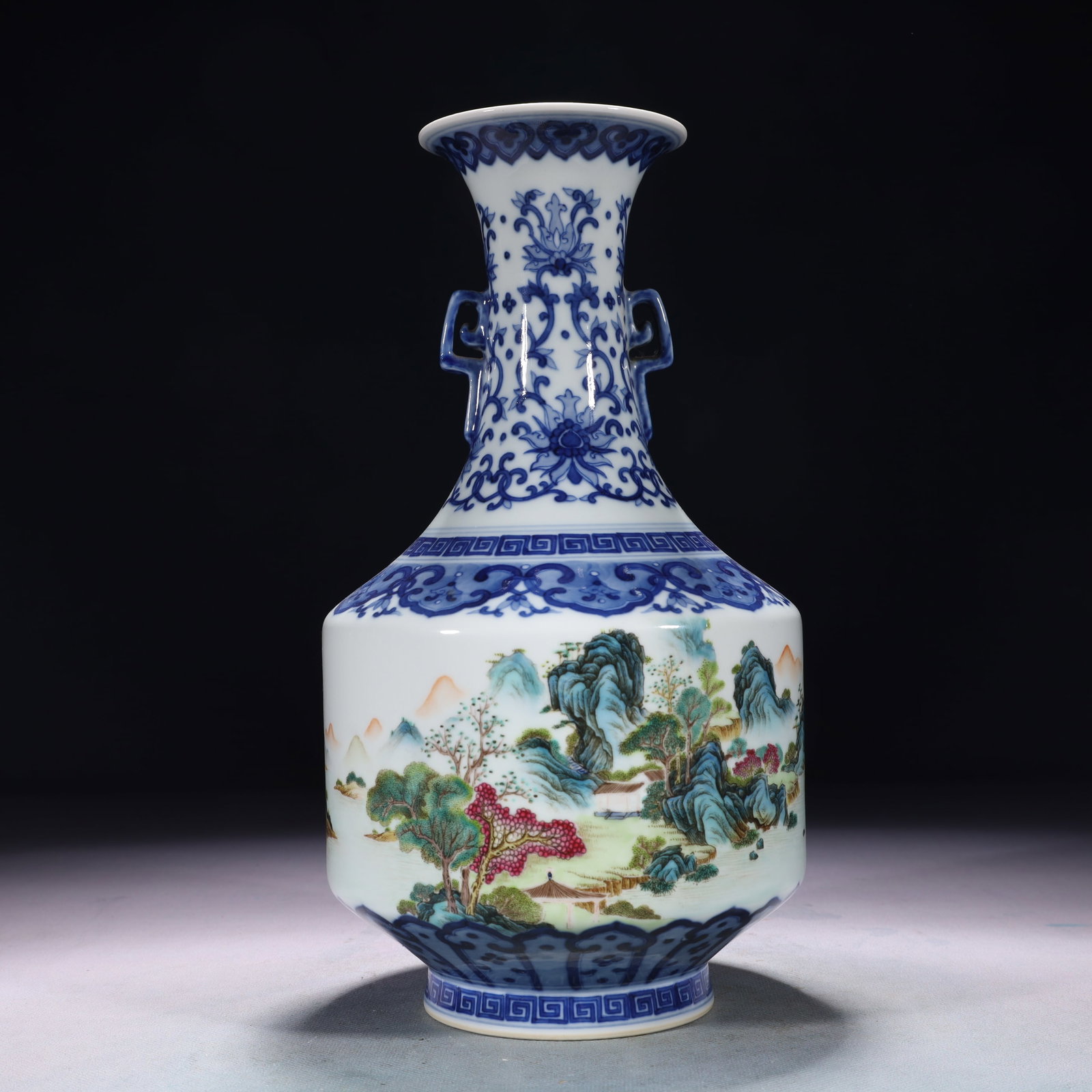 An Exquisite Blue and White Enamel Landscape Pattern Double-Ears Vase: An Exquisite Blue and White Enamel Landscape Pattern Double-Ears Vase,Qing Dynasty,China,Qianlong Six-character Mark,Size:5.9inx11.4in,Weight:1400g