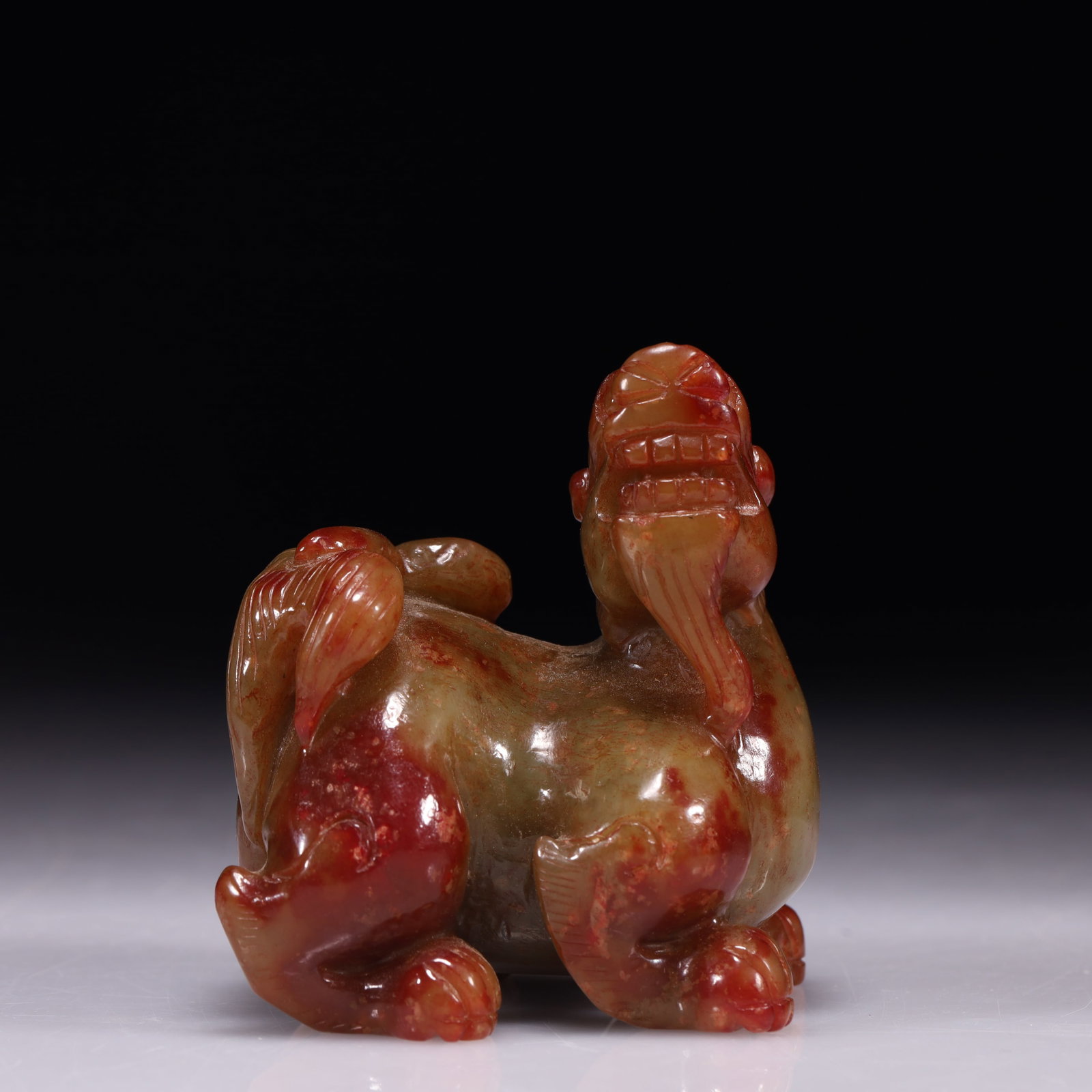An Exquisite Archaic Jade Unicorn Ornament (1 of 10)
