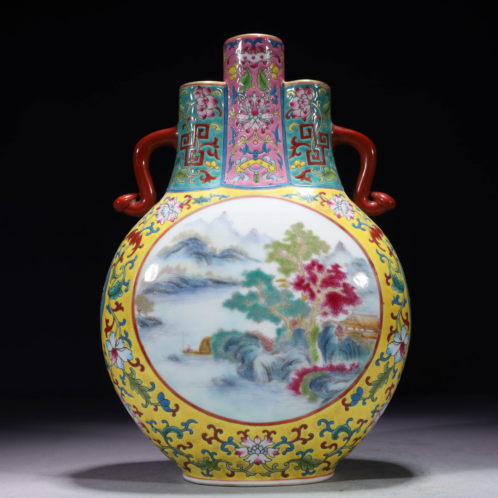 An Exquisite Yellow Ground Enamel Landscape Pattern Double-Ears Vase: An Exquisite Yellow Ground Enamel Landscape Pattern Double-Ears Vase,Qing Dynasty,China,Qianlong Four-character Mark,Size:7.1inx3.9inx11in,Weight:1800g 黄地珐琅彩山