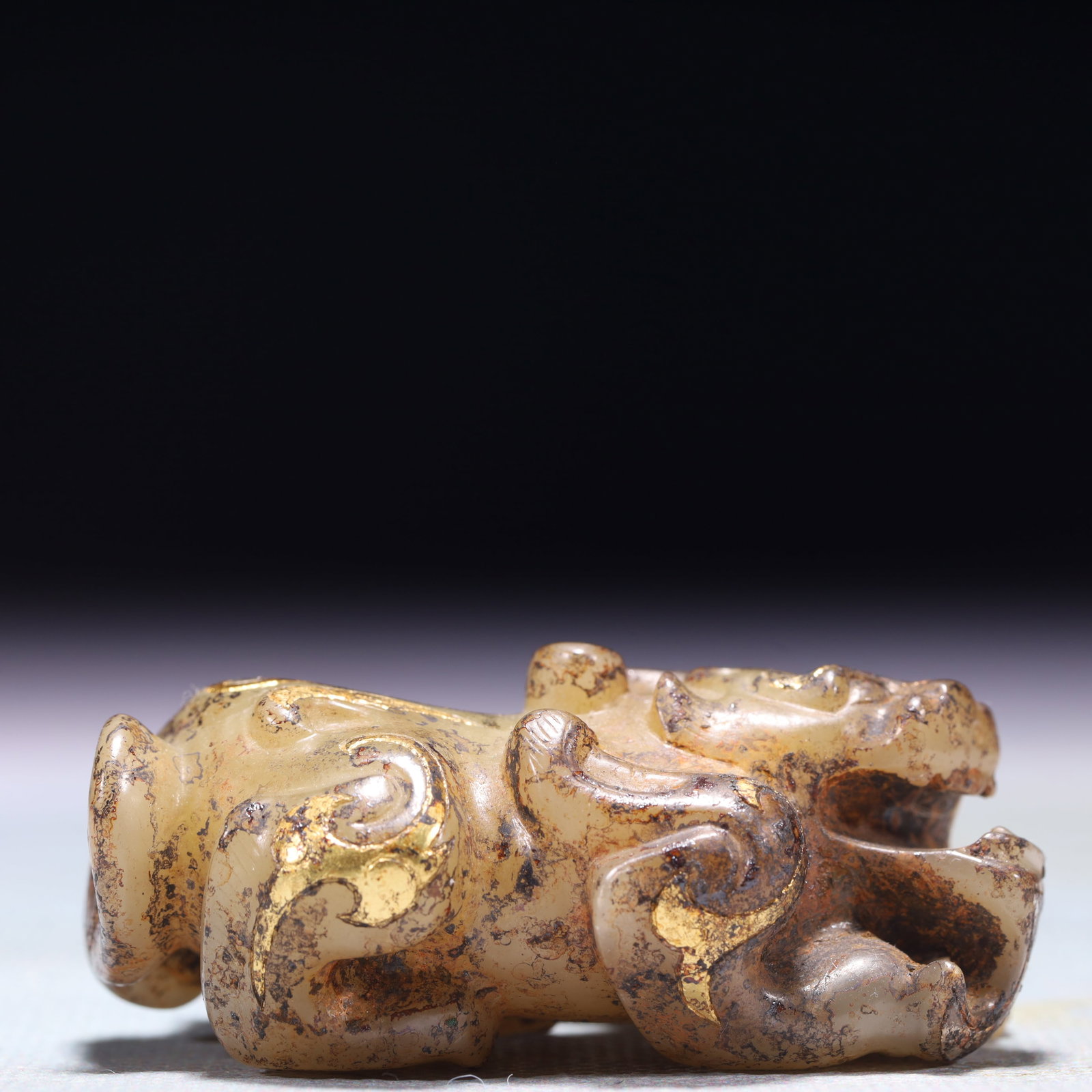 An Exquisite Archaic Jade Inlaid Gold and Silver Unicorn Ornament (1 of 9)