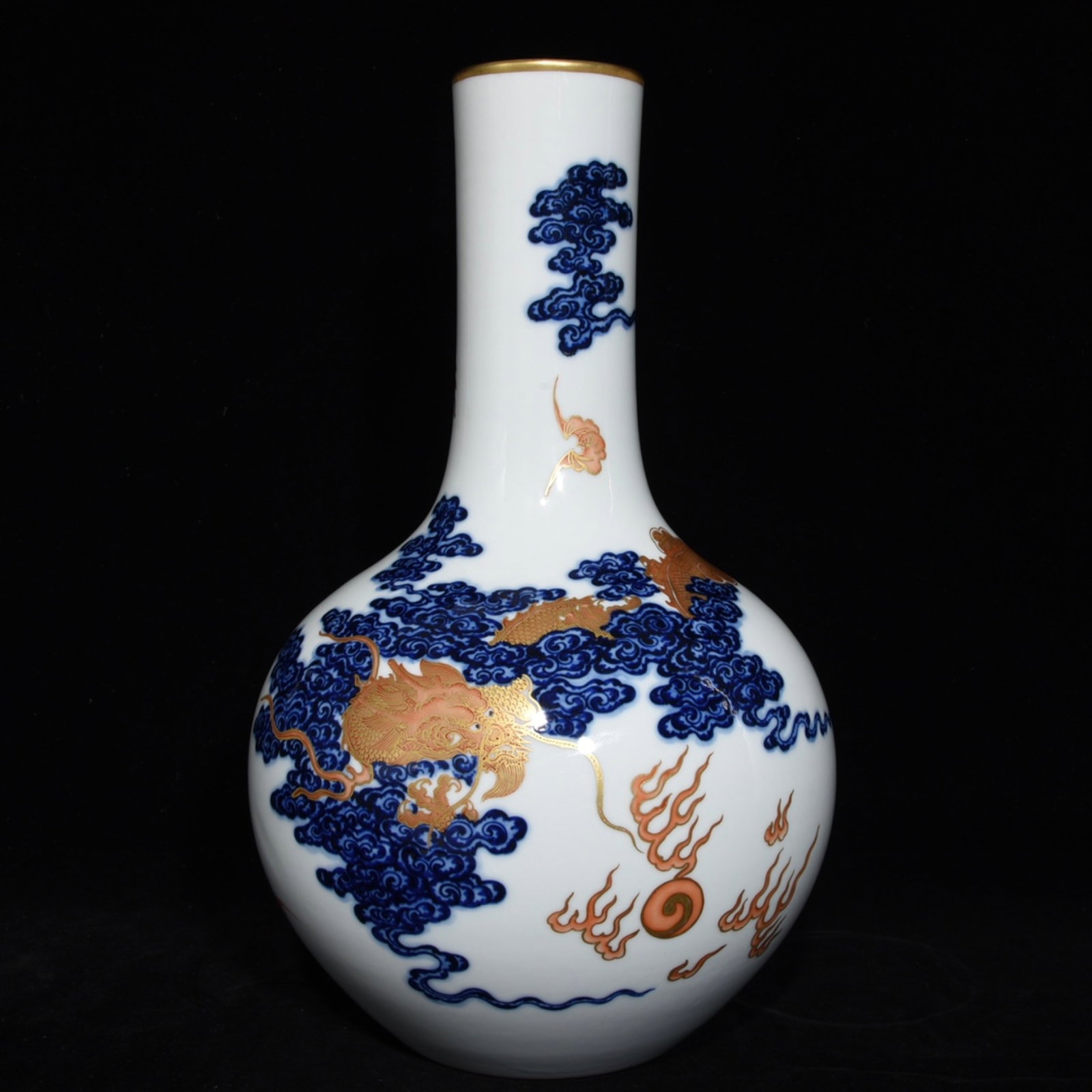 A Rare Blue and White Iron-Red Painted Gold Auspicious Cloud and Dragon Pattern Vase: A Rare Blue and White Iron-Red Painted Gold Auspicious Cloud and Dragon Pattern Vase,Qing Dynasty,China,Qianlong Six-character Mark,Size:14.6inx8.5in