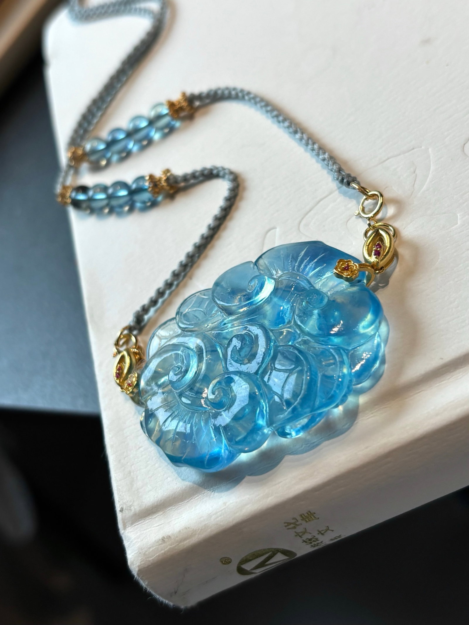 An Exquisite Aquamarine Ruyi Necklace: An Exquisite Aquamarine Ruyi Necklace,Size:1.9inx1.3inx0.4in,Weight:25g 海蓝宝如意项链