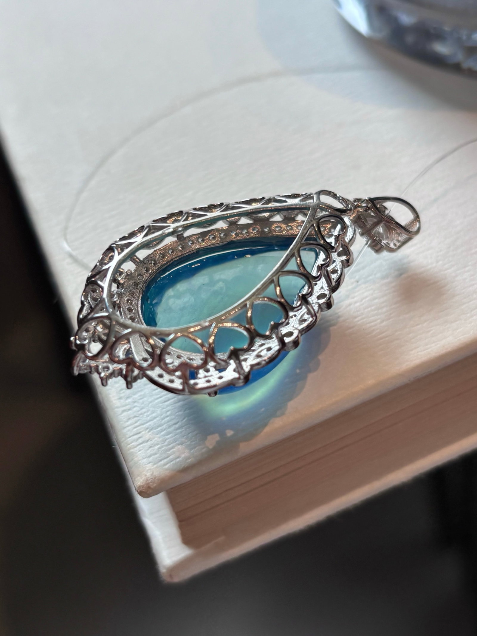 An Exquisite Sterling Silver Inlaid Aquamarine Necklace: An Exquisite Sterling Silver Inlaid Aquamarine Necklace,Size:1.1inx0.7in,Weight:15g 纯银镶海蓝宝项链