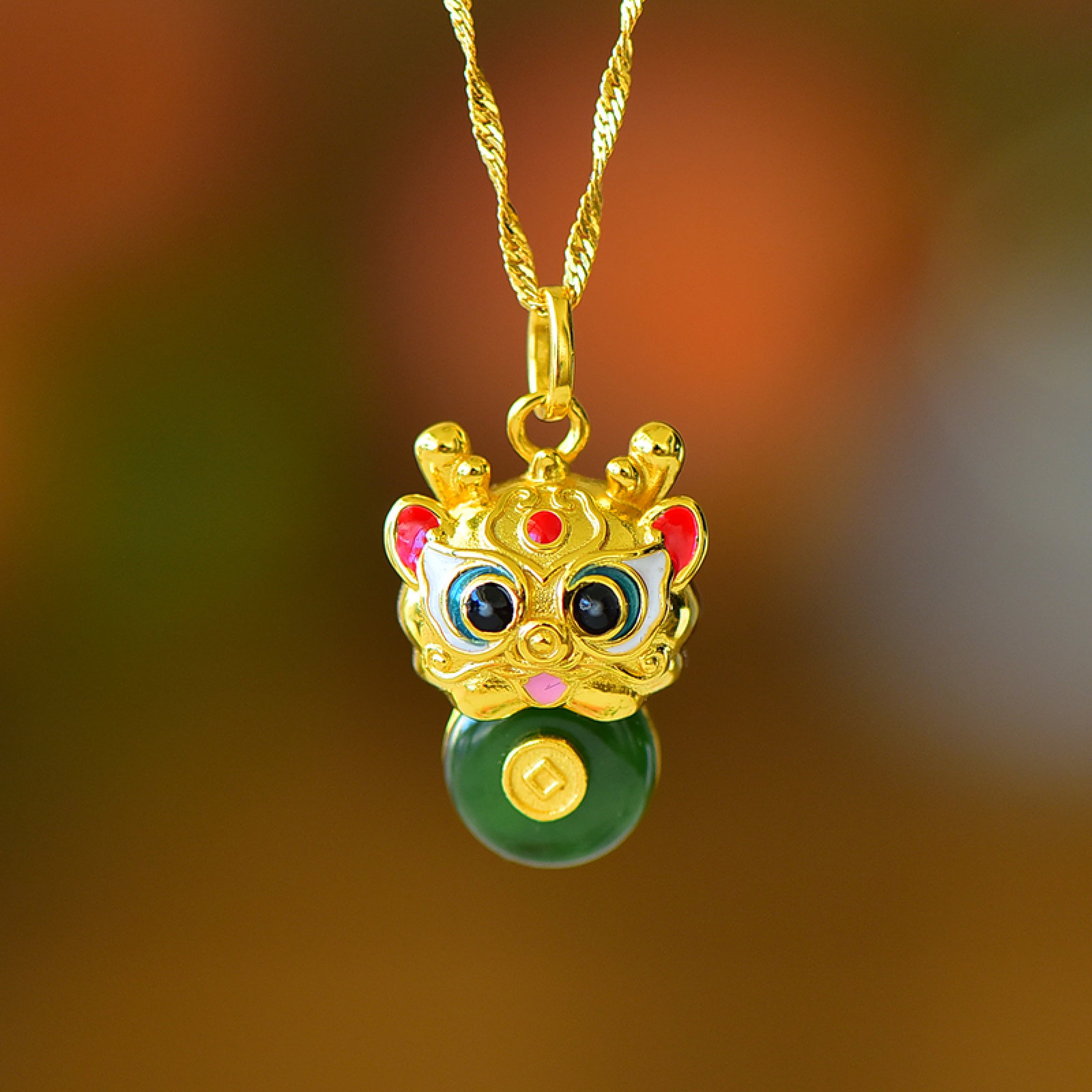 An Exquisite Gold Ground Enamel Pomegranate Ornament: An Exquisite Gold Ground Enamel Pomegranate Ornament,Qing Dynasty,China,Qianlong Six-character Mark,Size:7.9inx6.3in