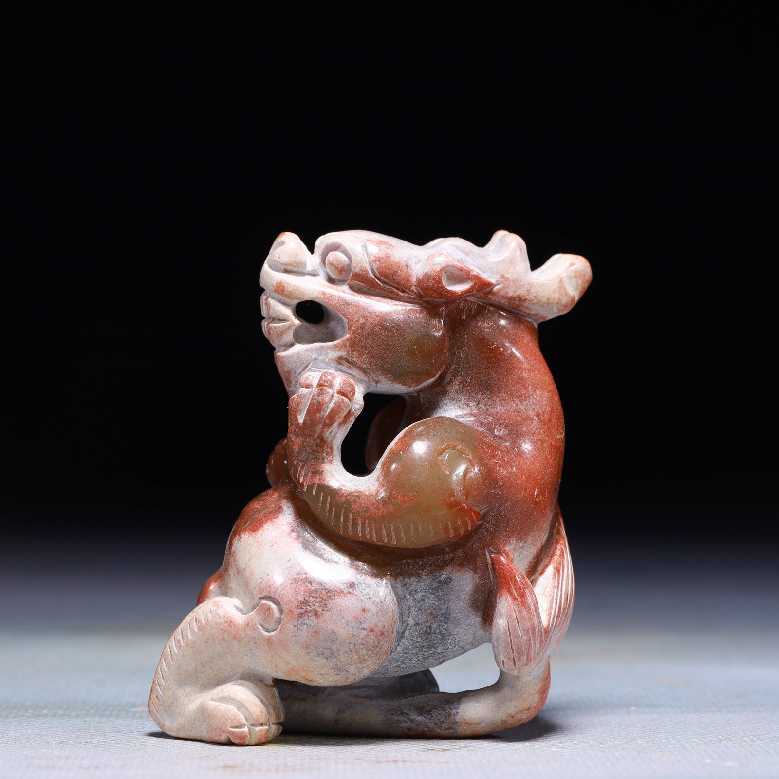 An Exquisite Archaic Jade Beast Ornament (1 of 6)
