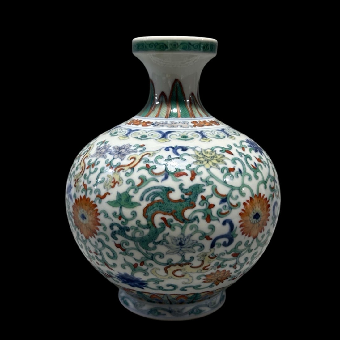 An Exquisite Blue and White Doucai Lotus and Dragon Pattern Jar: An Exquisite Blue and White Doucai Lotus and Dragon Pattern Jar,Qing Dynasty,China,Qianlong Six-character Mark,Size:4.5inx6.7in