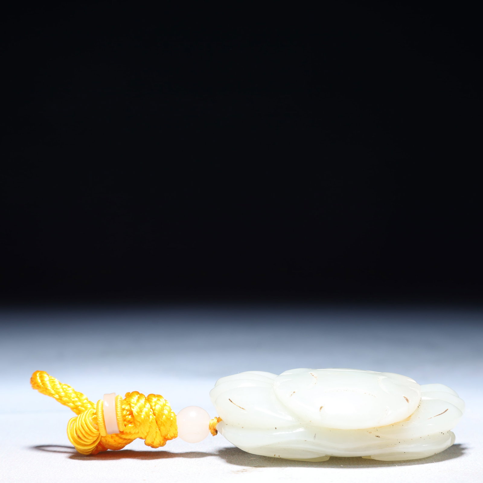An Exquisite White Jade Crab Pendant