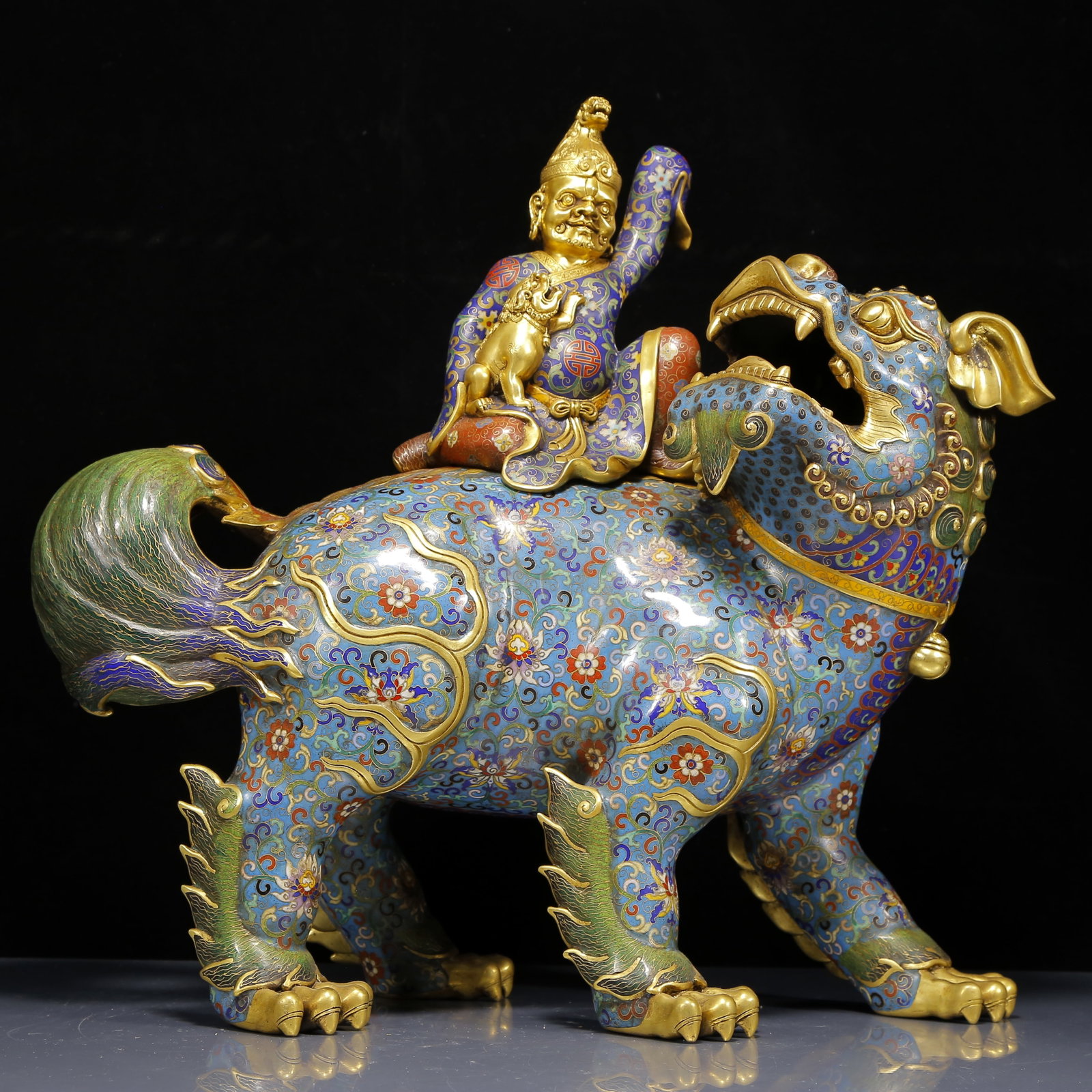 A Huge Cloisonne Figure Riding Lion Censer: A Huge Cloisonne Figure Riding Lion Censer,Qing Dynasty, China,Qianlong Four-character Mark,Size:20.5inx7.1inx19.7in,Weight:16760g 景泰蓝胡人戏狮香Ġ