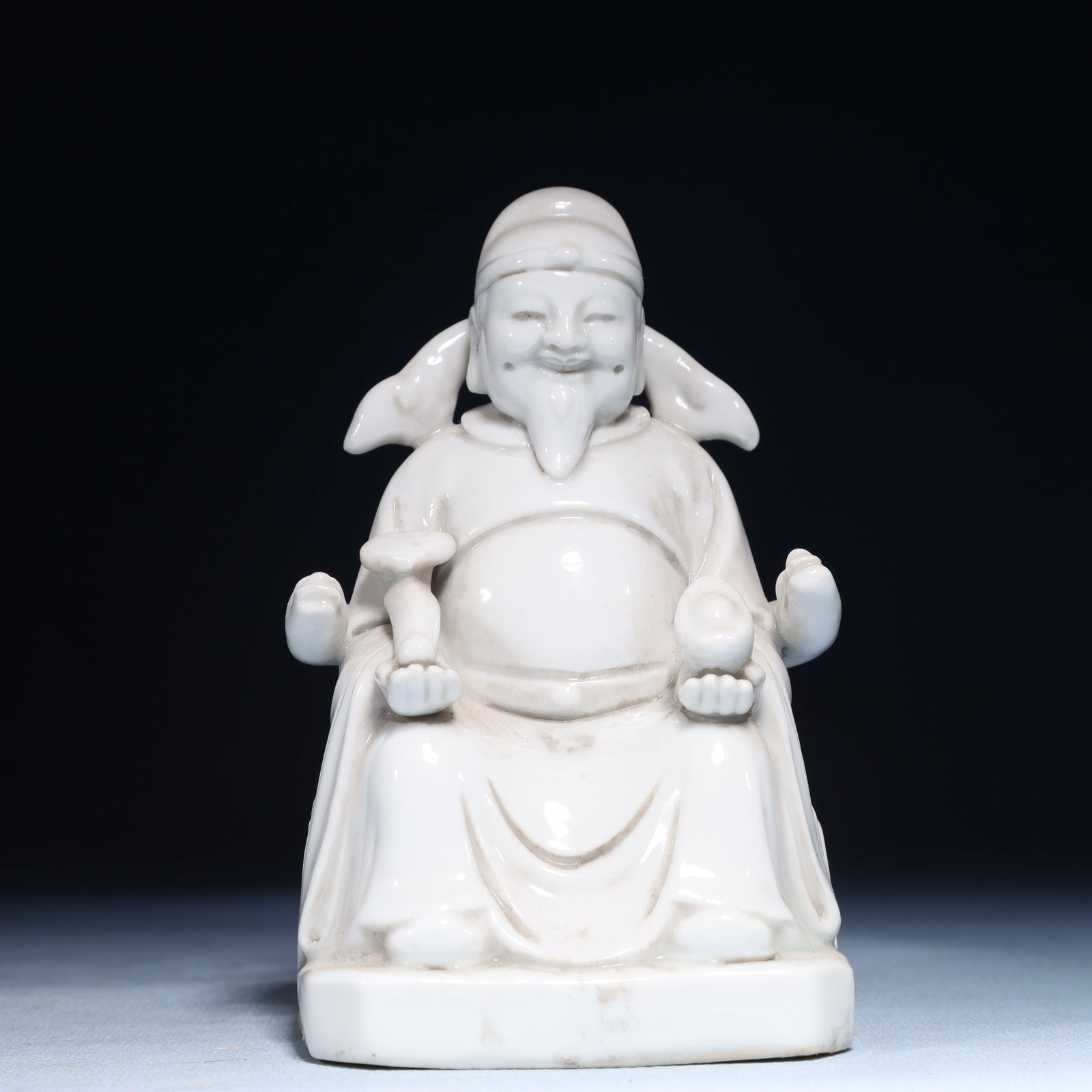 A Solemn Blance-De-Chine Statue of Mammon (1 of 5)