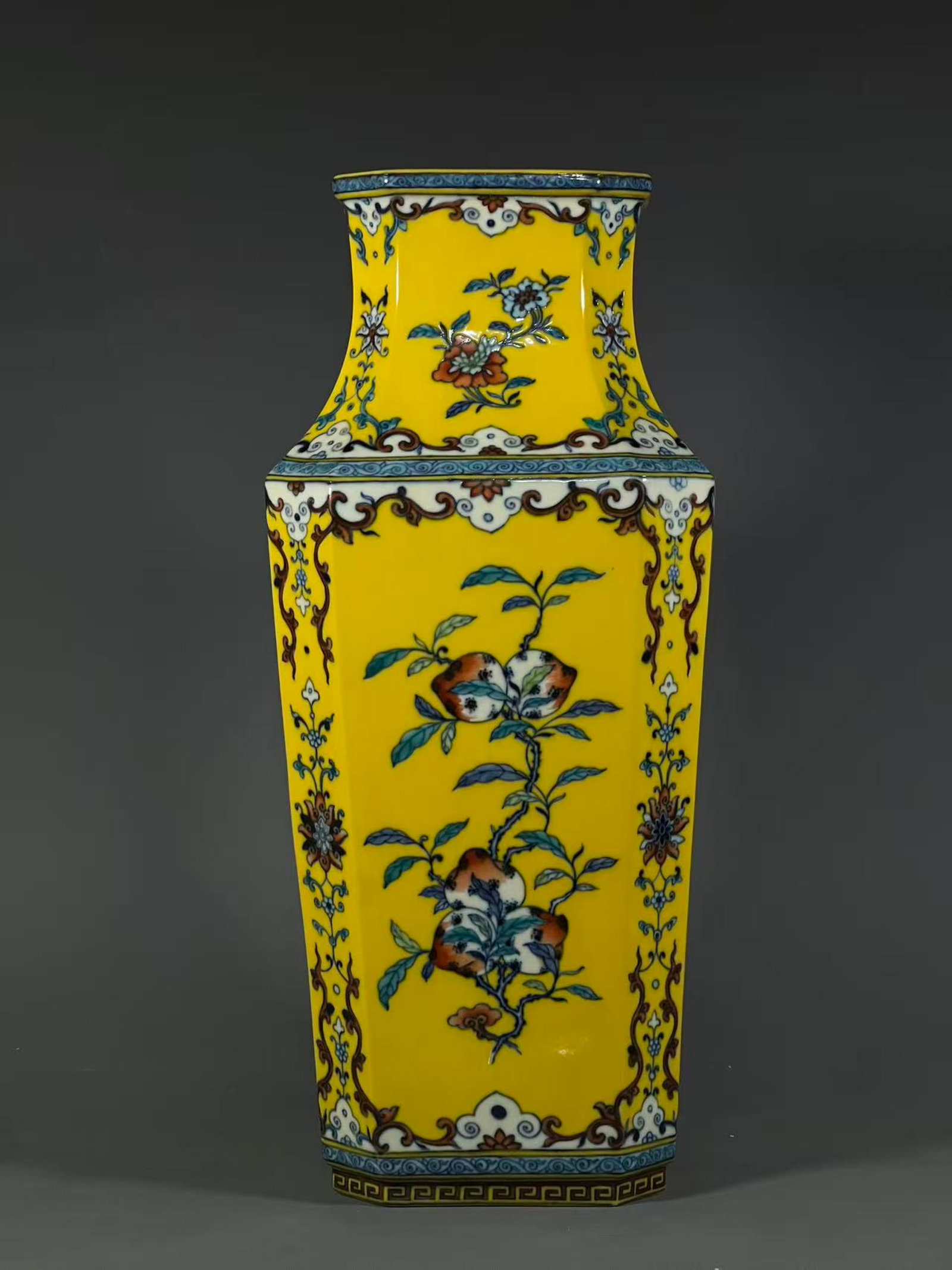 A Huge Yellow Ground Famille-Rose Flower and Fruit Pattern Vase: A Huge Yellow Ground Famille-Rose Flower and Fruit Pattern Vase,Qing Dynasty,China,Qianlong Six-character Mark,Size:18inx5.9in