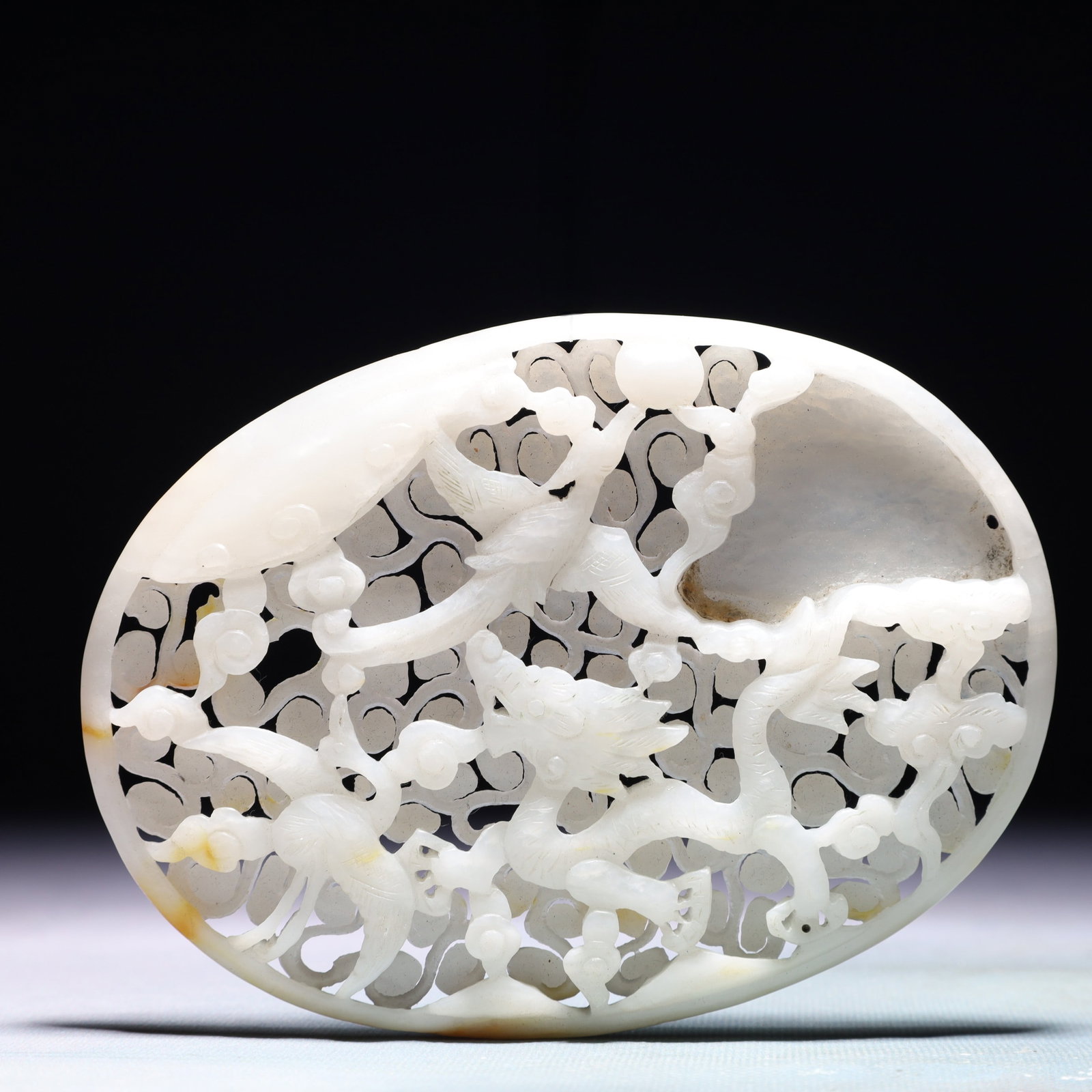 An Exquisite White Jade Auspicious Cloud and Phoenix Pattern Pendant: An Exquisite White Jade Auspicious Cloud and Phoenix Pattern Pendant,Qing Dynasty,China,Size:5.9inx4.3in,Weight:250.4g 白玉祥云凤纹佩,中国清