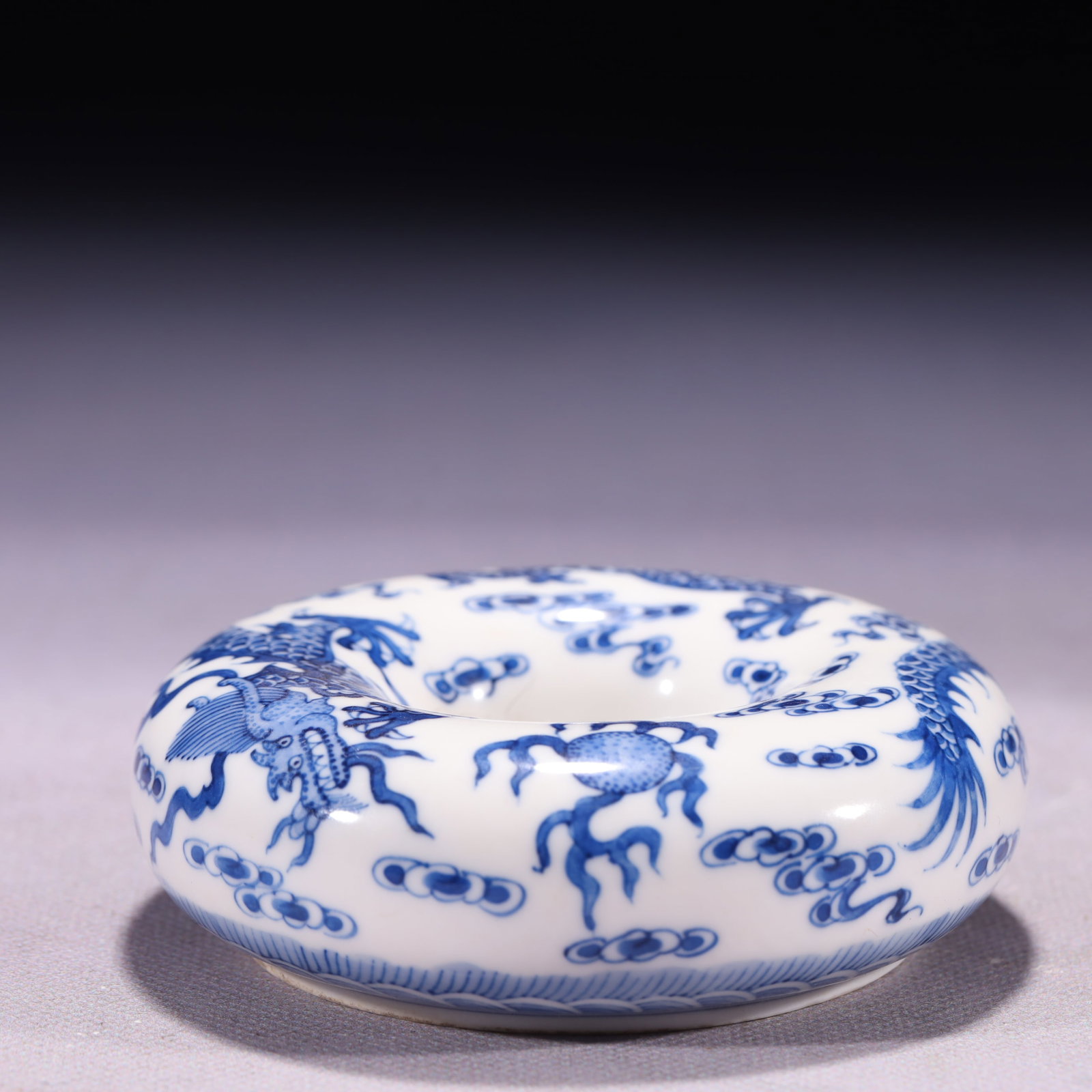 An Exquisite Blue and White Auspicious Cloud and Dragon Pattern Ornament: An Exquisite Blue and White Auspicious Cloud and Dragon Pattern Ornament,Qing Dynasty,China,Size:3.7inx1.2in,Weight:407g