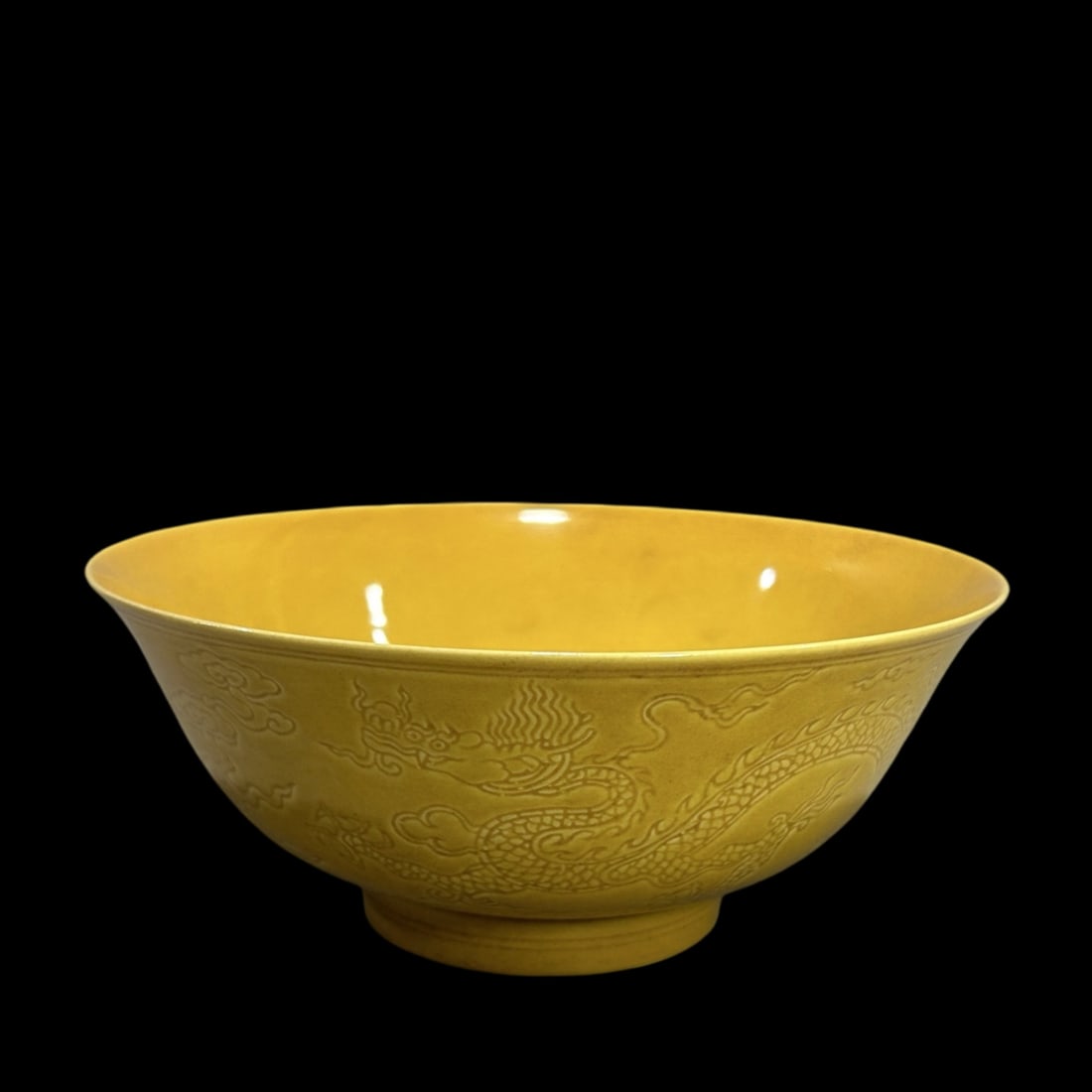 An Exquisite Yellow Glazed Auspicious Cloud and Dragon Pattern Bowl: An Exquisite Yellow Glazed Auspicious Cloud and Dragon Pattern Bowl,Ming Dynasty,China,Hongzhi Six-character Mark,Size:3.2inx7.3in