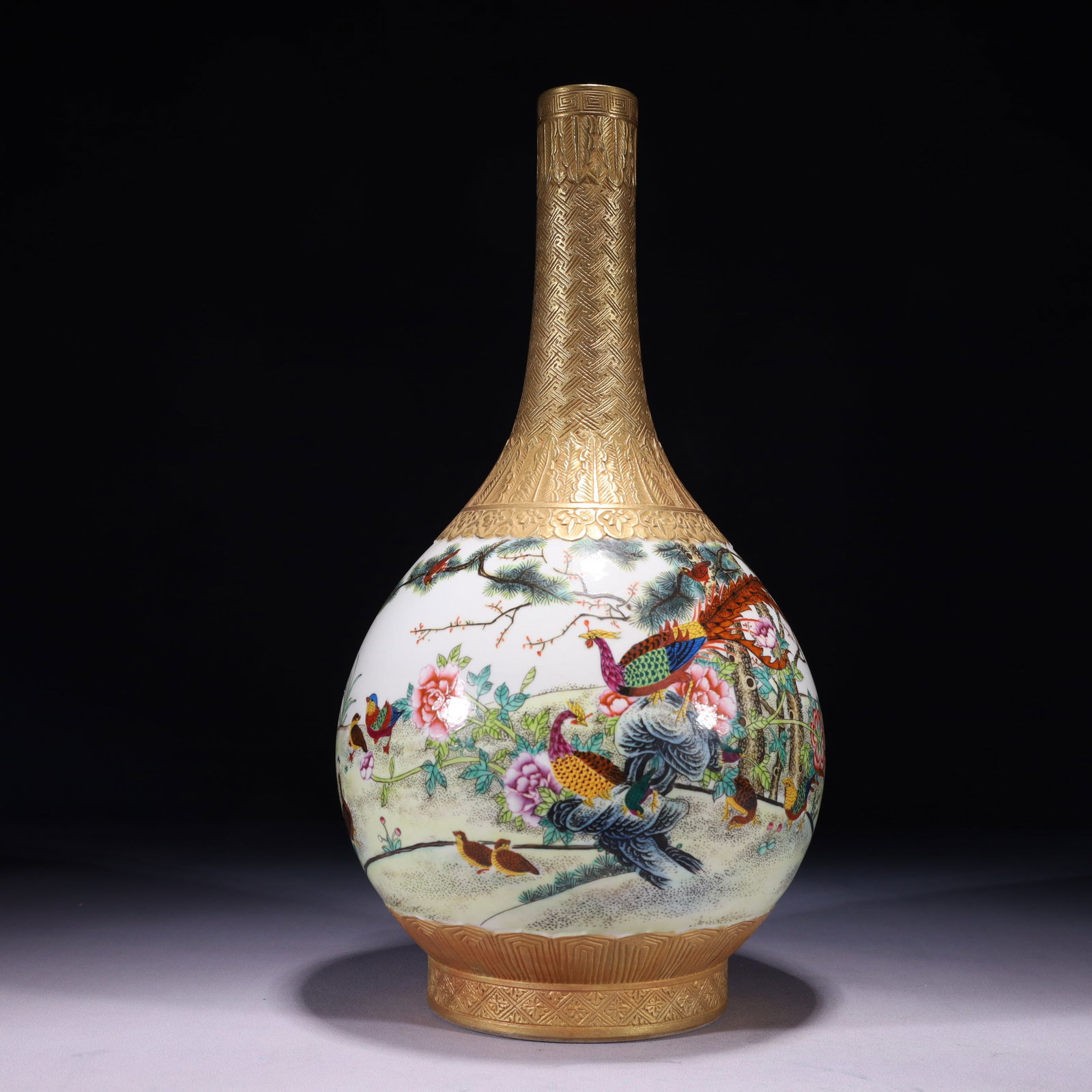An Exquisite Gold Ground Famille-Rose Flower and Peacock Pattern Vase: An Exquisite Gold Ground Famille-Rose Flower and Peacock Pattern Vase,Qing Dynasty,China,Qianlong Six-character Mark,Size:6.7inx15.4in,Weight:2500g