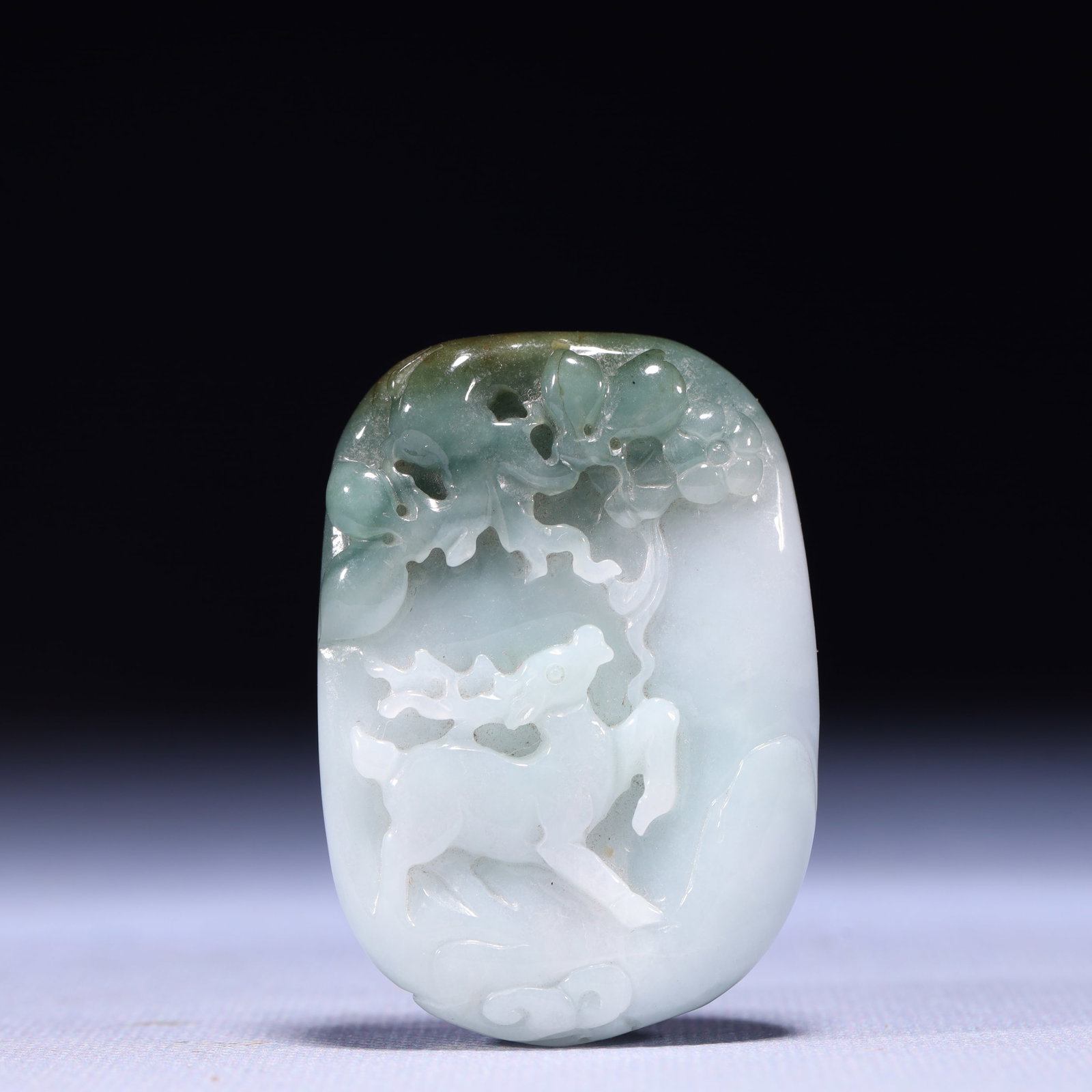 An Exquisite Jadeite Deer Pattern Pendant: An Exquisite Jadeite Deer Pattern Pendant,Qing Dynasty,China,Size:1.6inx0.4inx2.4in,Weight:72g 翡翠鹿纹挂件,中国清代