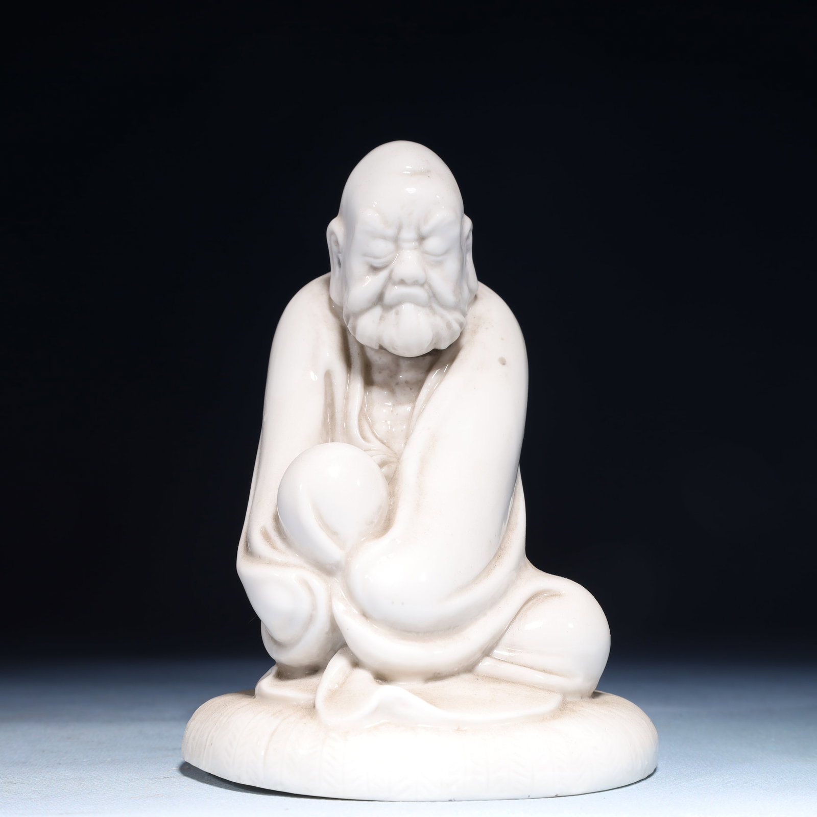 A Solemn Blance-De-Chine Statue of Arhat: A Solemn Blance-De-Chine Statue of Arhat Blance-De-Chine Statue of Arhat,Ming Dynasty,China,He Chaozong Mark,Size:4.1inx4.1inx5.5in,Weight:350g