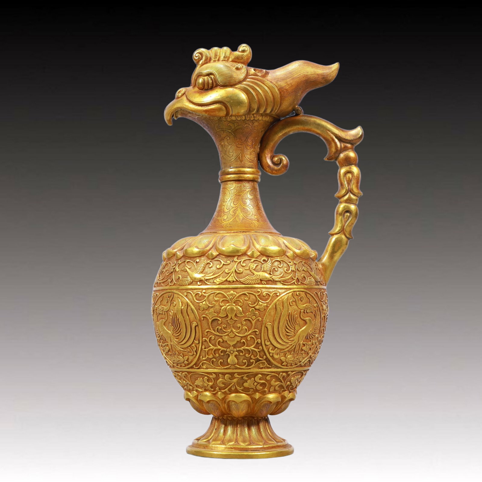 A Rare Gilt Bronze Lotus and Phoenix Pattern Ewer: A Rare Gilt Bronze Lotus and Phoenix Pattern Ewer,Tang Dynasty, China,Size:5.1inx3.9inx9.8in,Weight:750g 铜鎏金缠枝莲凤纹执壶,中ࢲ