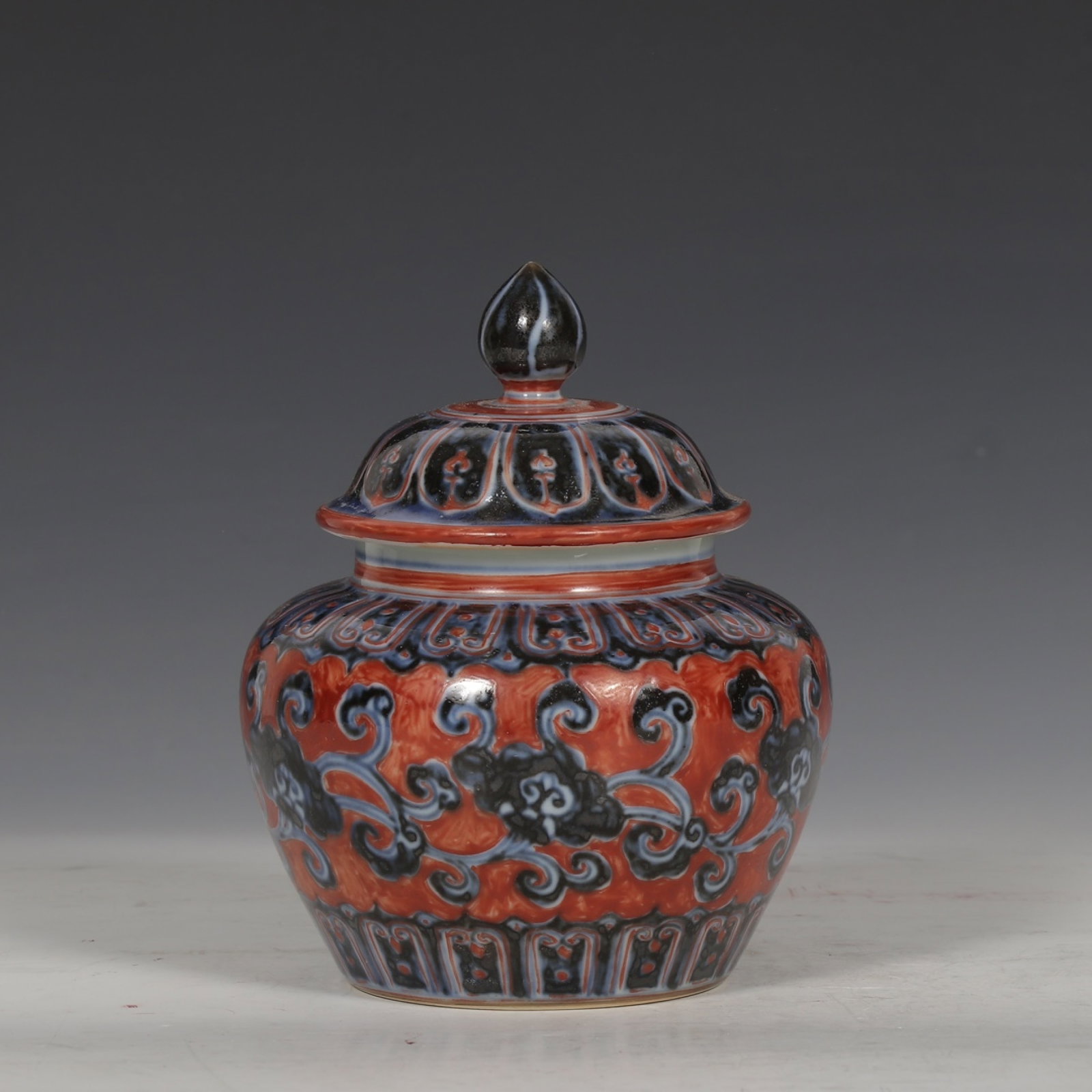 An Exquisite Blue and White Iron-Red Ganoderma lucidum Pattern Jar with Cover: An Exquisite Blue and White Iron-Red Ganoderma lucidum Pattern Jar with Cover,Ming Dynasty,China,Xuande Six-character Mark,Size:5.7inx4.7in