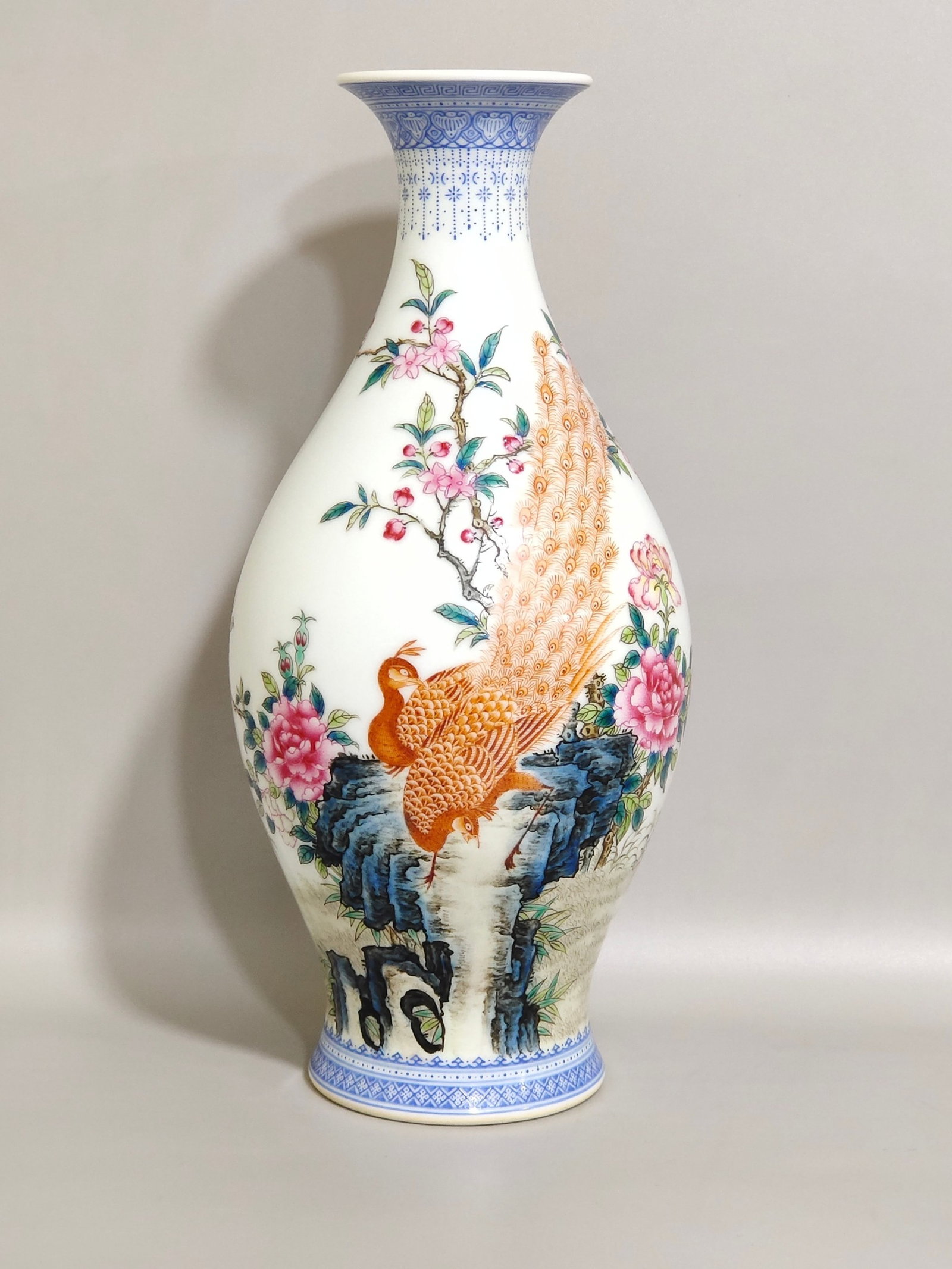 An Exquisite Famille-Rose Iron-Red Flower and Peacock Pattern Vase,with poem: An Exquisite Famille-Rose Iron-Red Flower and Peacock Pattern Vase,with poem,Qing Dynasty,China,Yongzheng Six-character Mark,Size:8.5inx3.7in
