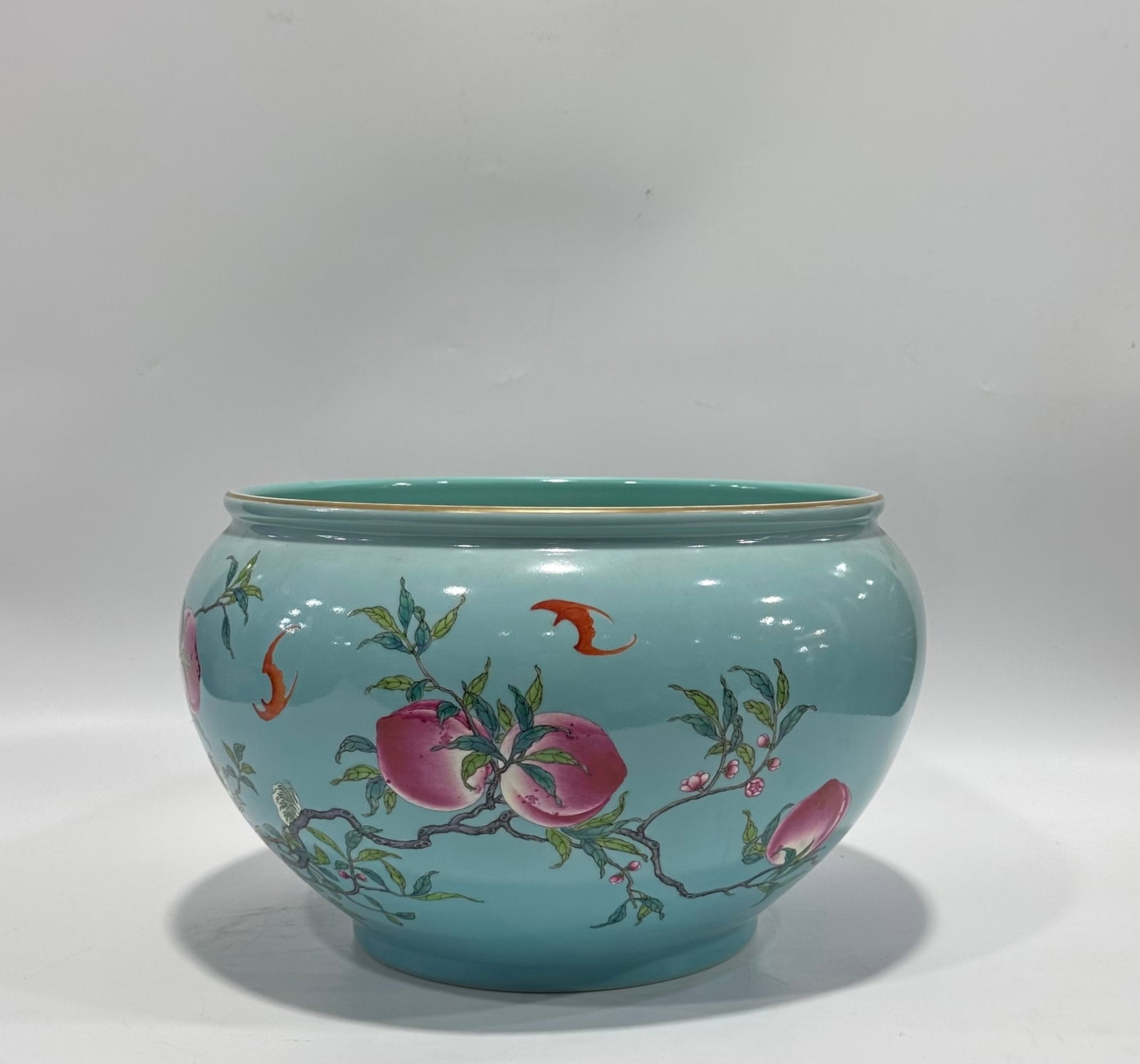 An Exquisite Turquoise Glazed Famille-Rose Painted Gold Bats and Peach Pattern Vat: An Exquisite Turquoise Glazed Famille-Rose Painted Gold Bats and Peach Pattern Vat,Qing Dynasty,China,Qianlong Six-character Mark,Size:8.8inx12.8in