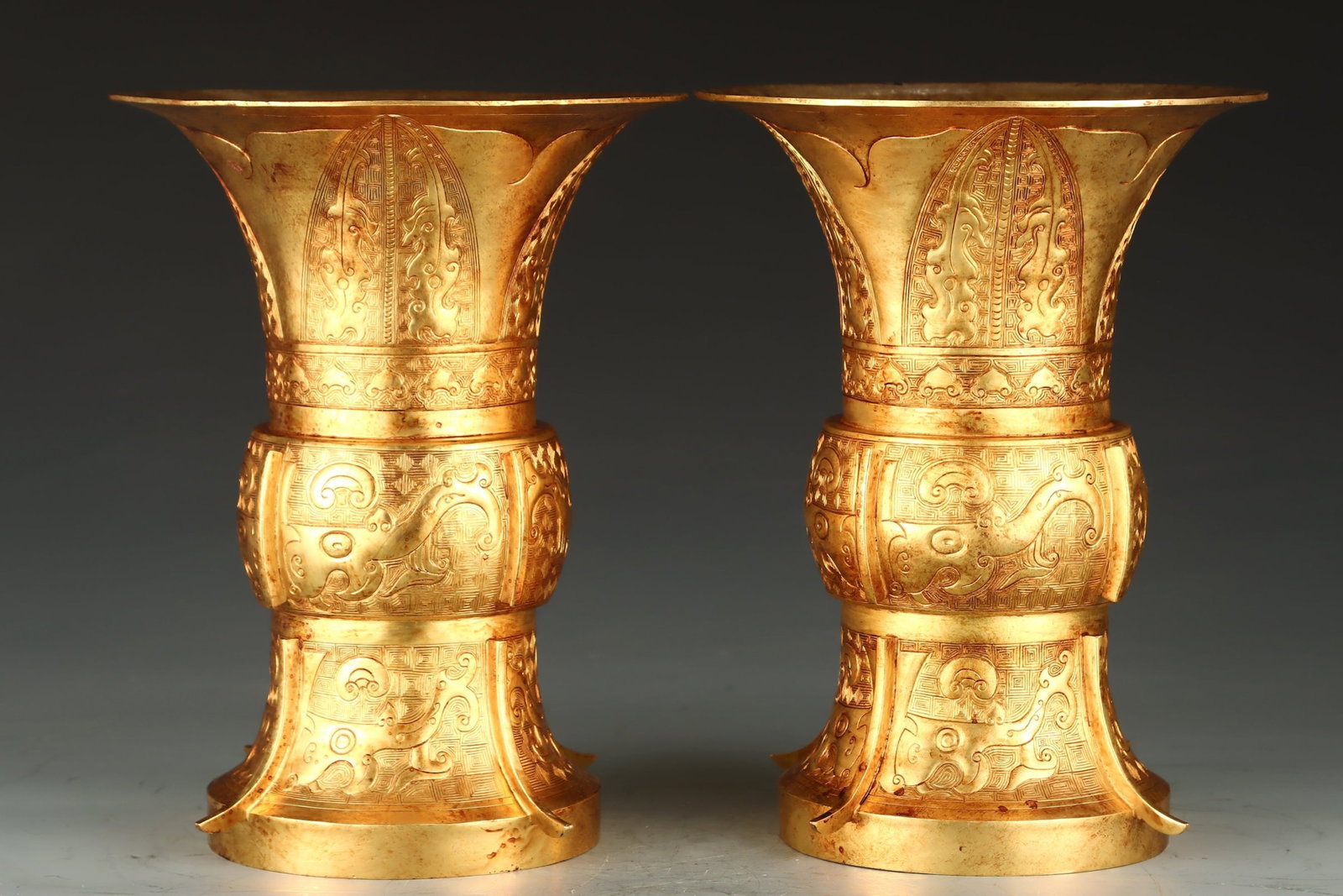 A Pair of Exquisite Gilt Bronze Beast Pattern Vases: A Pair of Exquisite Gilt Bronze Beast Pattern Vases,Qing Dynasty,China,Size:8.7inx8.7inx11.2in,Weight:4024g 一对铜鎏金兽纹瓶,中国清