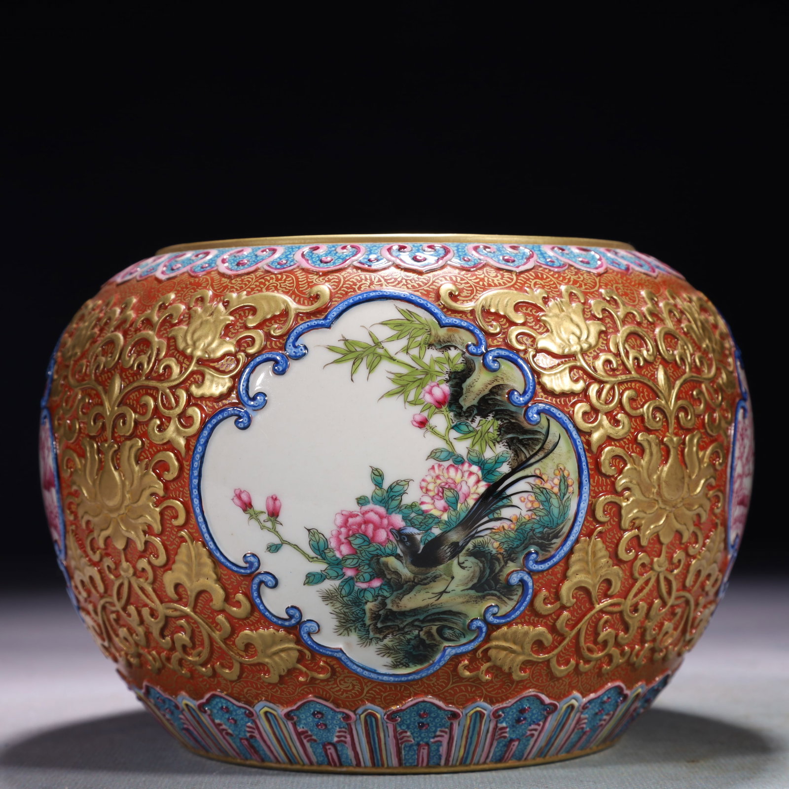 An Exquisite Red Ground Famille-Rose Painted Gold Landscape Pattern Vat (1 of 7)