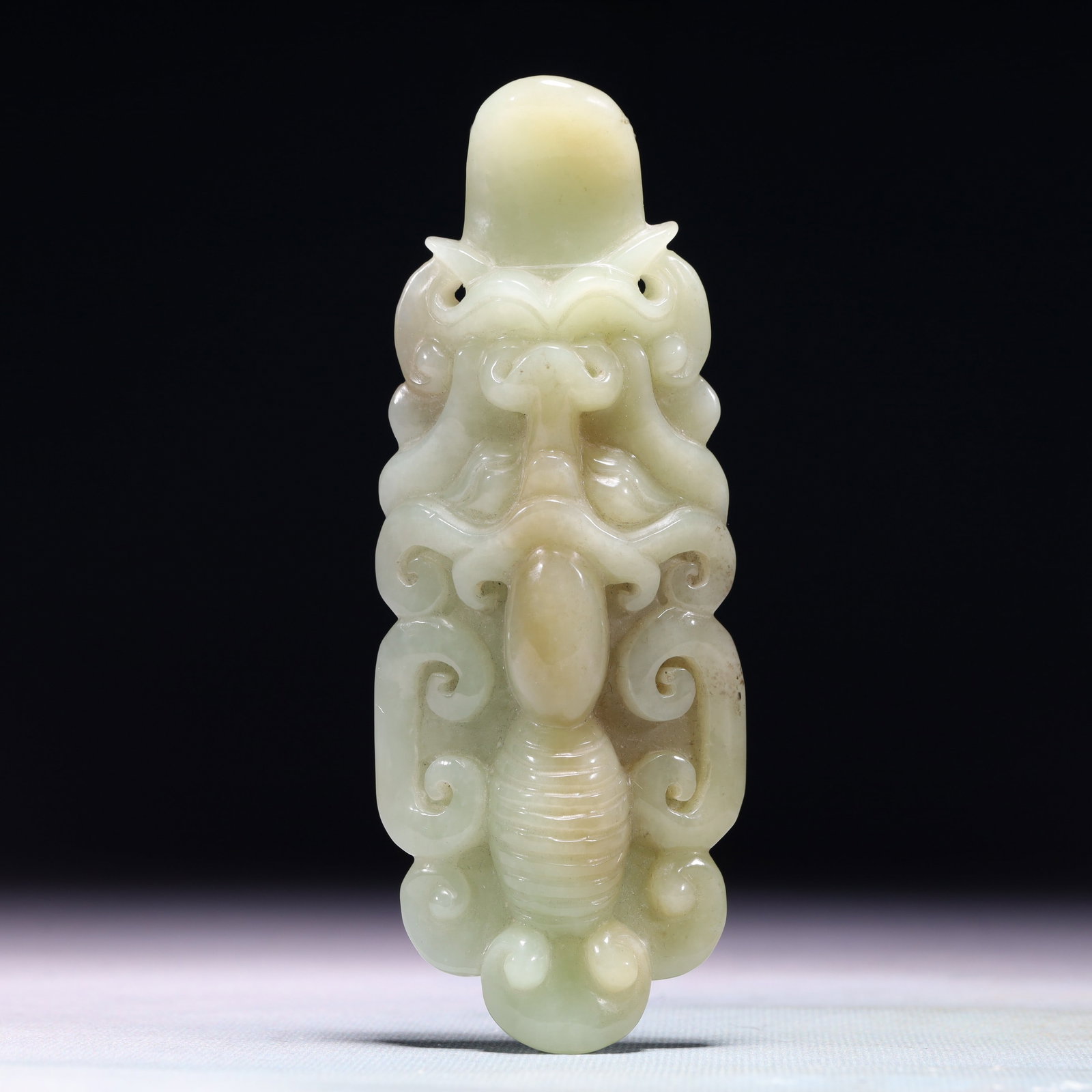 An Exquisite White Jade Beast-Face Pattern Pendant: An Exquisite White Jade Beast-Face Pattern Pendant,Qing Dynasty,China,Size:2.2inx5.5in,Weight:201.6g 白玉兽面纹挂件,中国清代