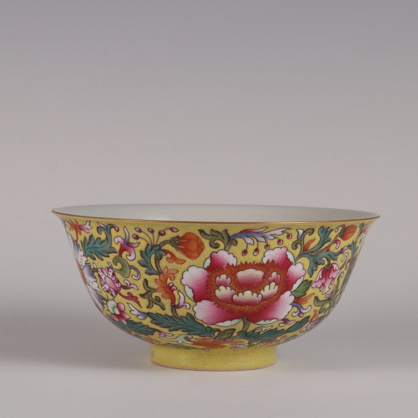 An Exquisite Yellow Ground Enamel Painted Gold Lotus Pattern Bowl: An Exquisite Yellow Ground Enamel Painted Gold Lotus Pattern Bowl,Qing Dynasty,China,Daoguang Six-character Mark,Size:2.8inx6in 黄地珐琅彩描金缠枝