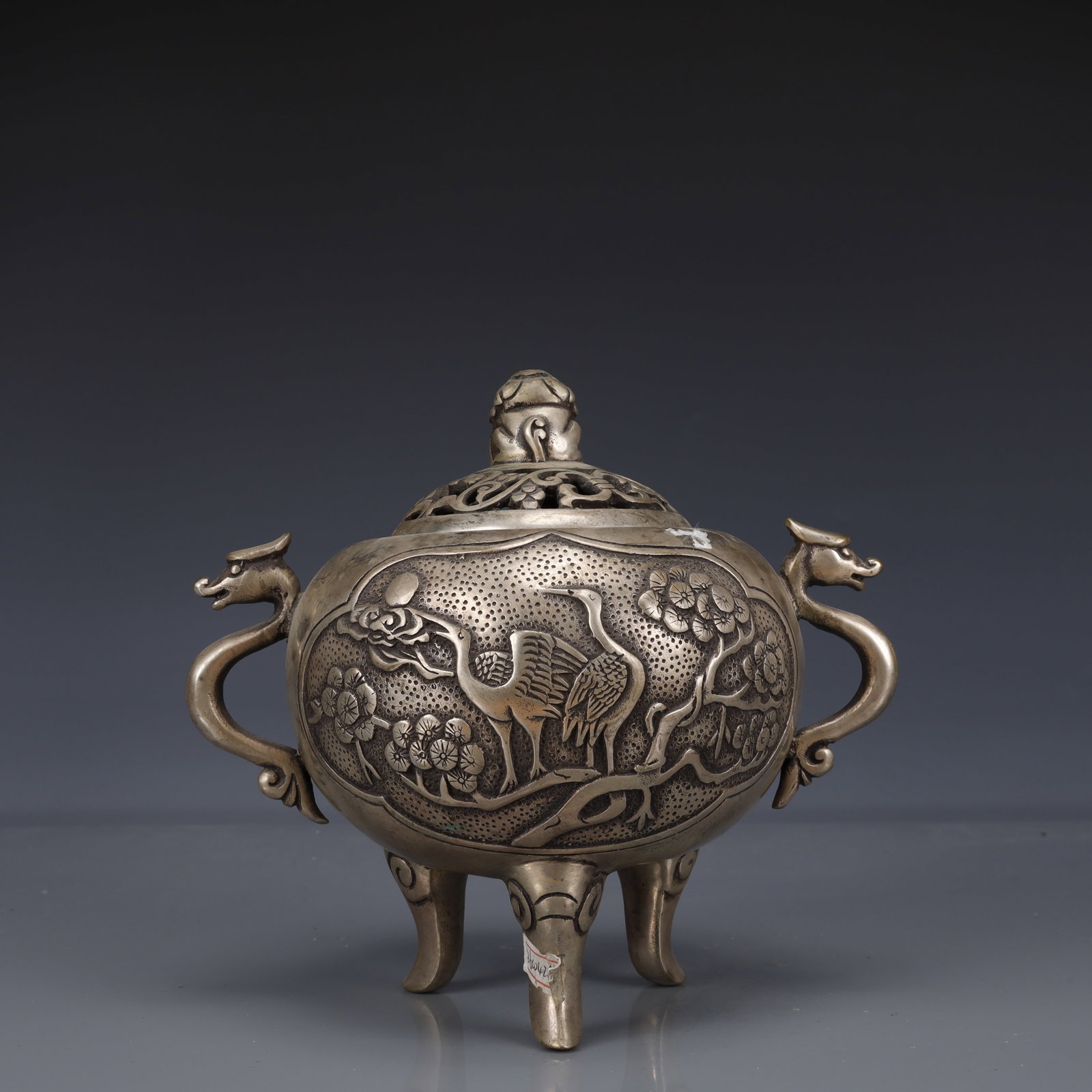 An Exquisite Silver-Plated Bronze Crane Pattern Double-Ears and Tripod Censer: An Exquisite Silver-Plated Bronze Crane Pattern Double-Ears and Tripod Censer,The Republic of China,Size:8.7inx5.5inx7.9in,Weight:1850g 铜镀银鹤纹双耳三