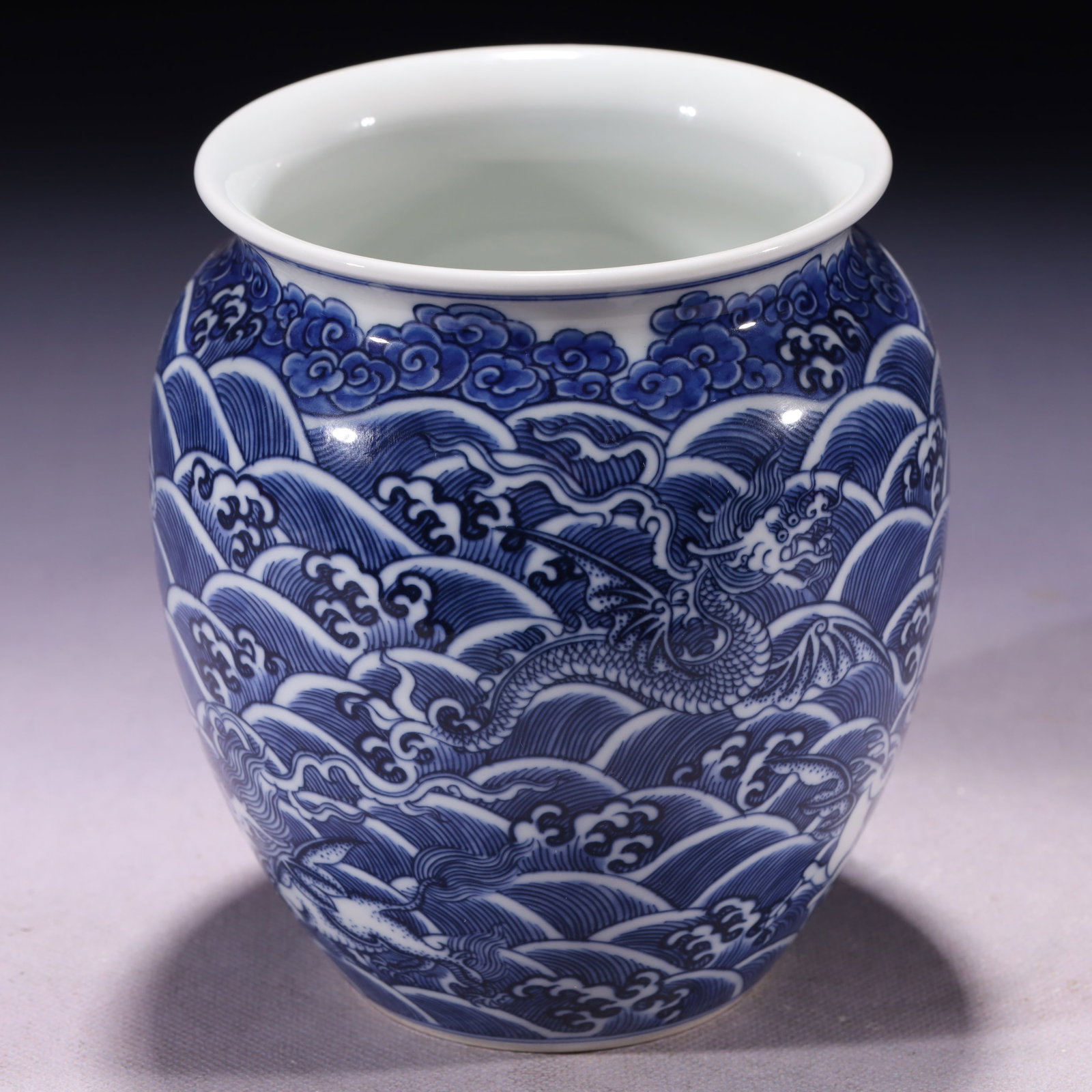 An Exquisite Blue and White Seawater and Beast Pattern Jar: An Exquisite Blue and White Seawater and Beast Pattern Jar,Qing Dynasty,China,Yongzheng Six-character Mark,Size:4.7inx6.3in,Weight:662g 青花海水兽纹罐,中