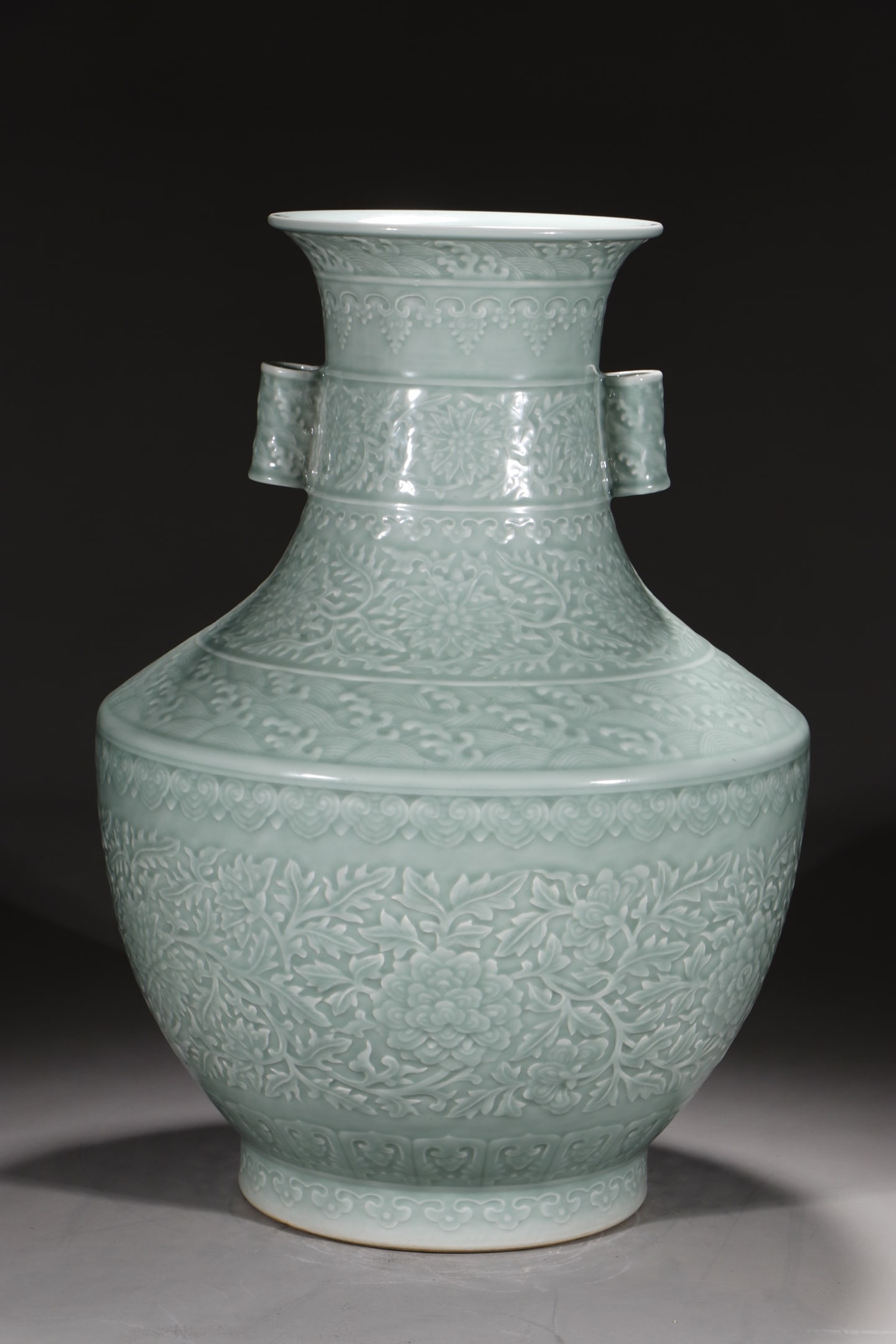 A Huge Celadon Glazed Lotus and Seawater Pattern Double-Ears Vase: A Huge Celadon Glazed Lotus and Seawater Pattern Double-Ears Vase,Qing Dynasty,China,Qianlong Six-character Mark,Size:21.7in 粉青釉缠枝莲海水纹