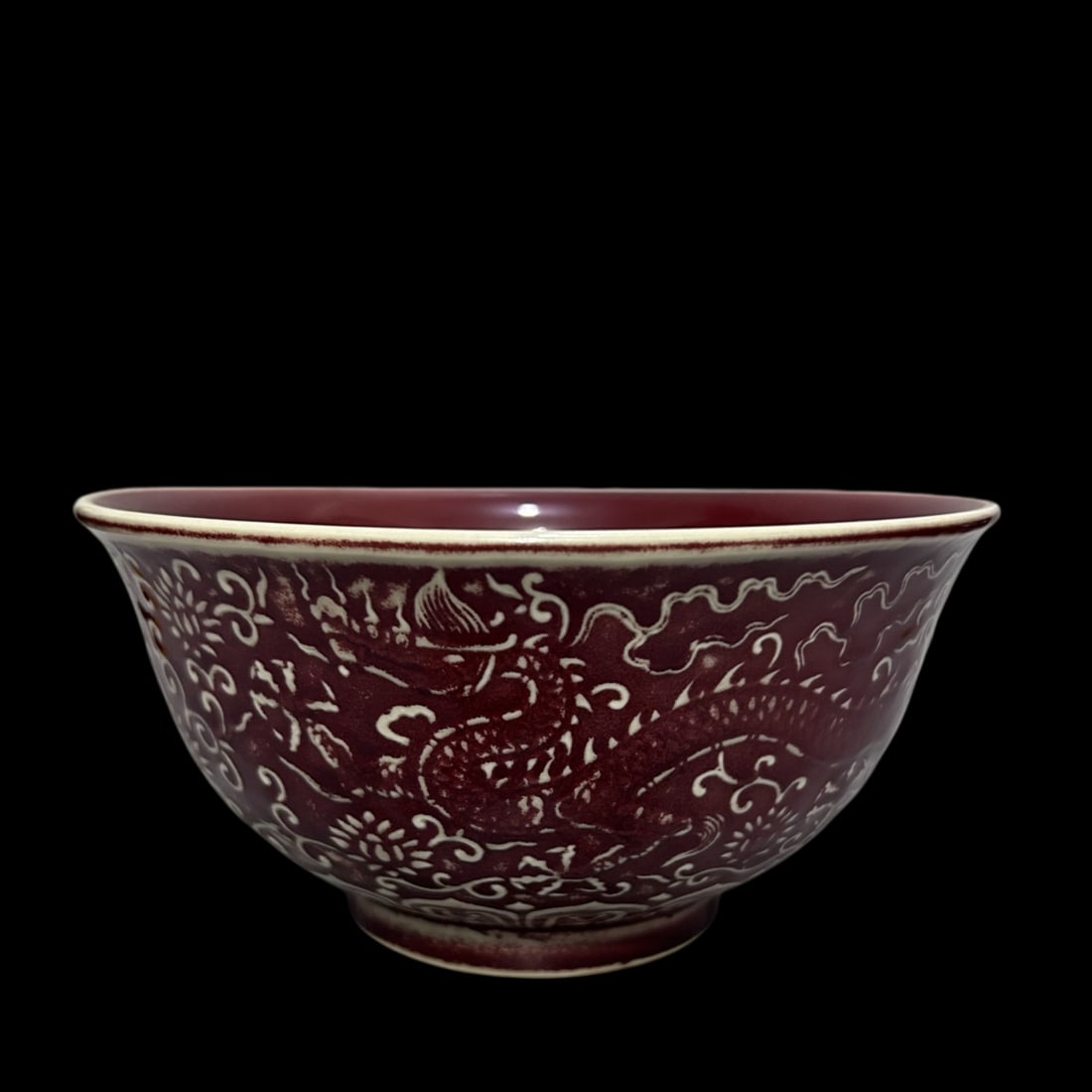 An Exquisite Underglaze-Red Lotus and Dragon Pattern Bowl: An Exquisite Underglaze-Red Lotus and Dragon Pattern Bowl,Ming Dynasty,China,Xuande Six-character Mark,Size:4.1inx8.1in
