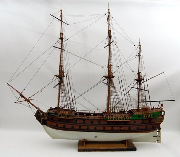 Model, detailed wood S.O.L.: Detailed Wood model Ship of the Line. Nicely rigged with belaying pins and cannons on carriages. Most likely a kit model. Mid 20th Century. ***ARTIST: Unknown ***Size 35" ***WORK DATE: C. 1950