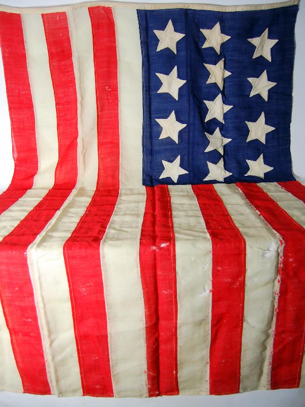 13-Star American Flag, 19th C: 13-Star American Flag, 19th C - wool applique stripes and canton with cotton stars; the canton cut on the backside to accept the shape of each star so that it would appear white on both sides. (see im