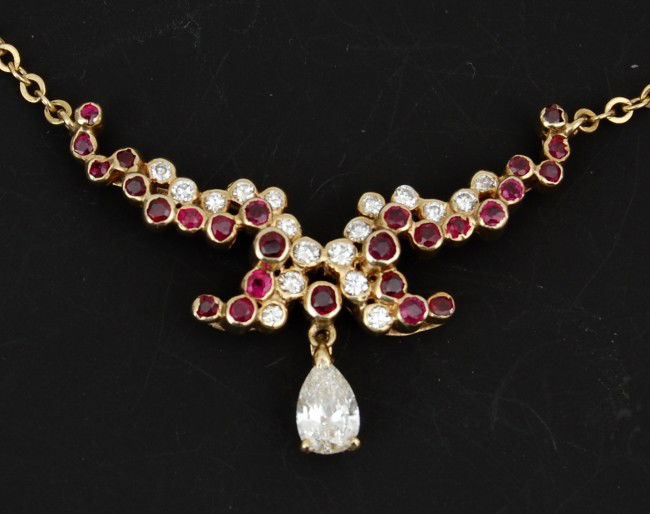 Necklace, 14k y.g.; 27 rubies/18 diamonds: Necklace, 14 k y.g.; 27 rubies/18 diamonds - 1 p. shape diamond=.42 ct. 27 rd rubies & 18 rd diamonds, circa 1960 Size: 16"